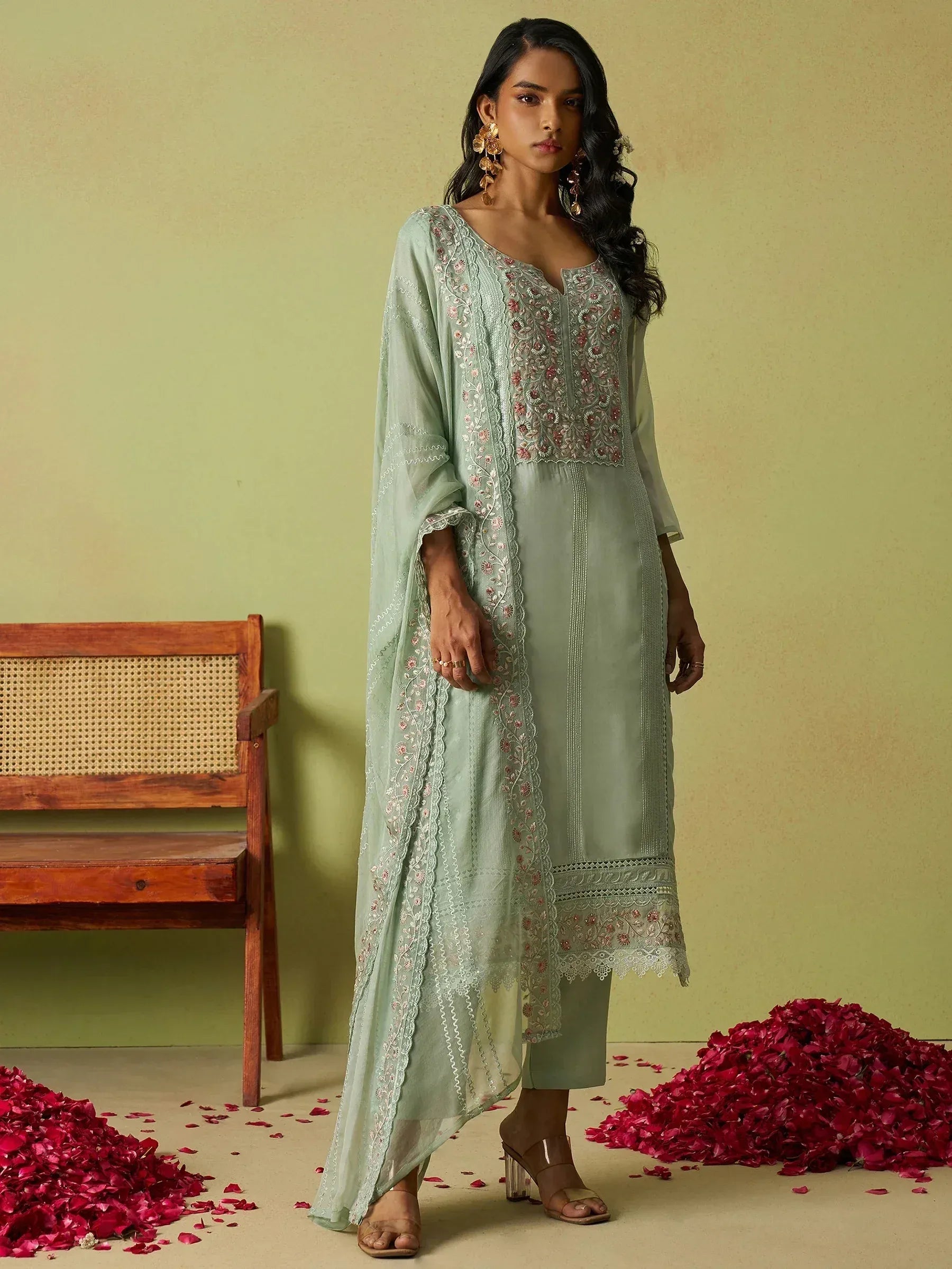 Mint green embroidered kurta with sheer dupatta, floral detailing, and palazzo pants for ethnic wear