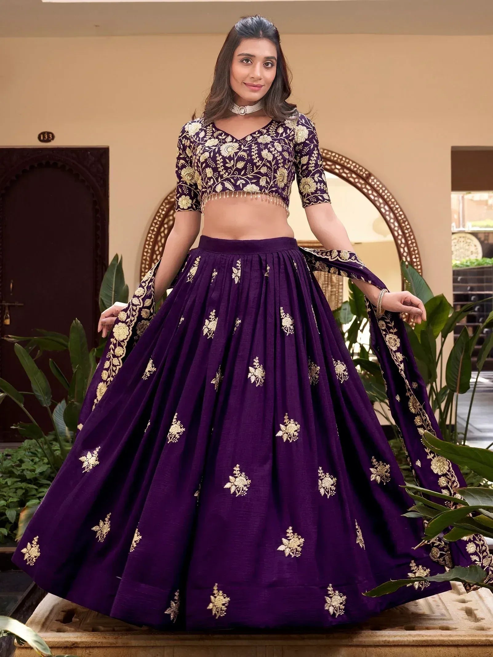 Purple lehenga choli with gold floral embroidery, perfect for Indian ethnic wear occasions