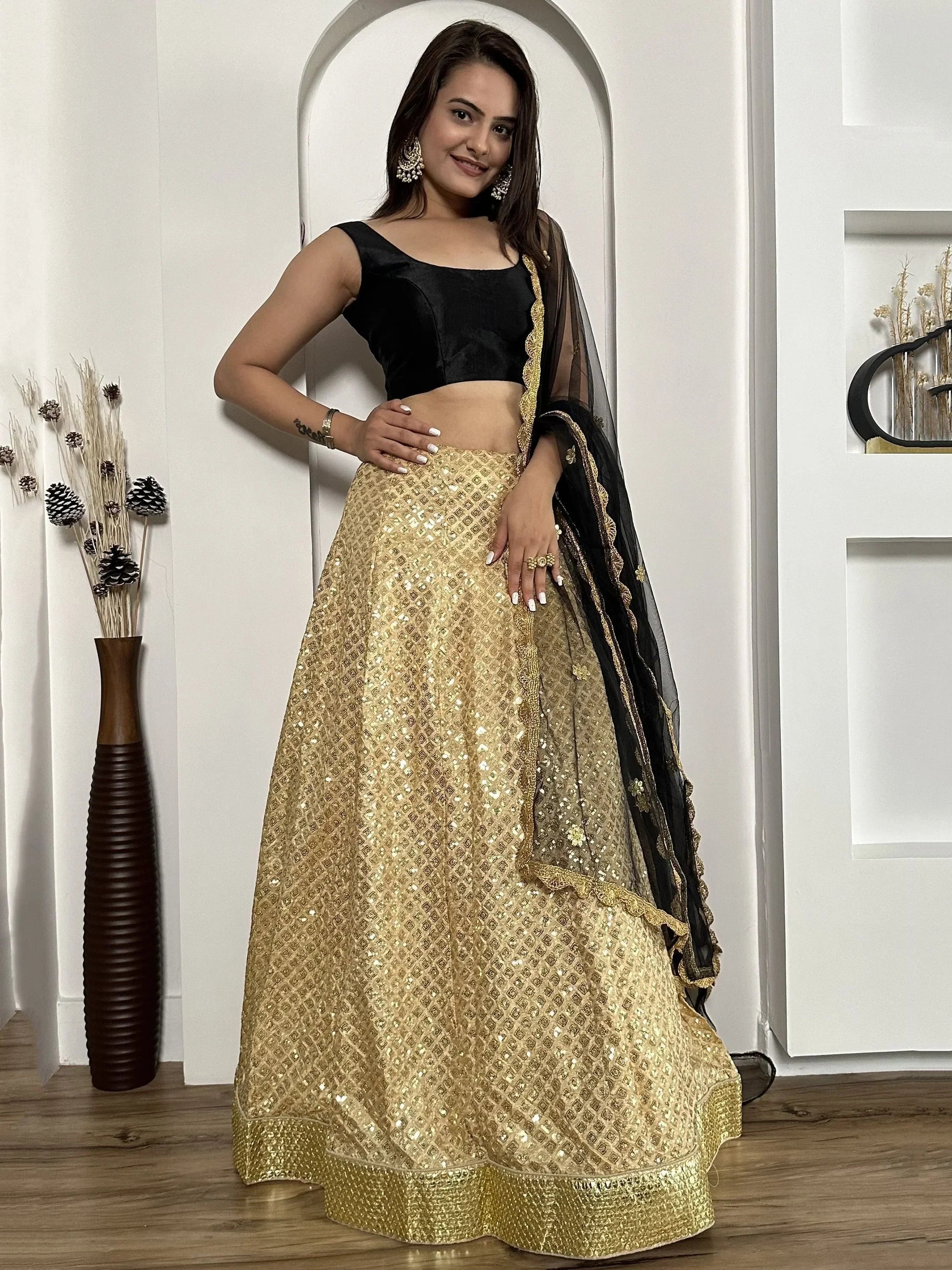 Black and gold sequin lehenga choli with sheer dupatta, Indian ethnic wear for weddings and parties