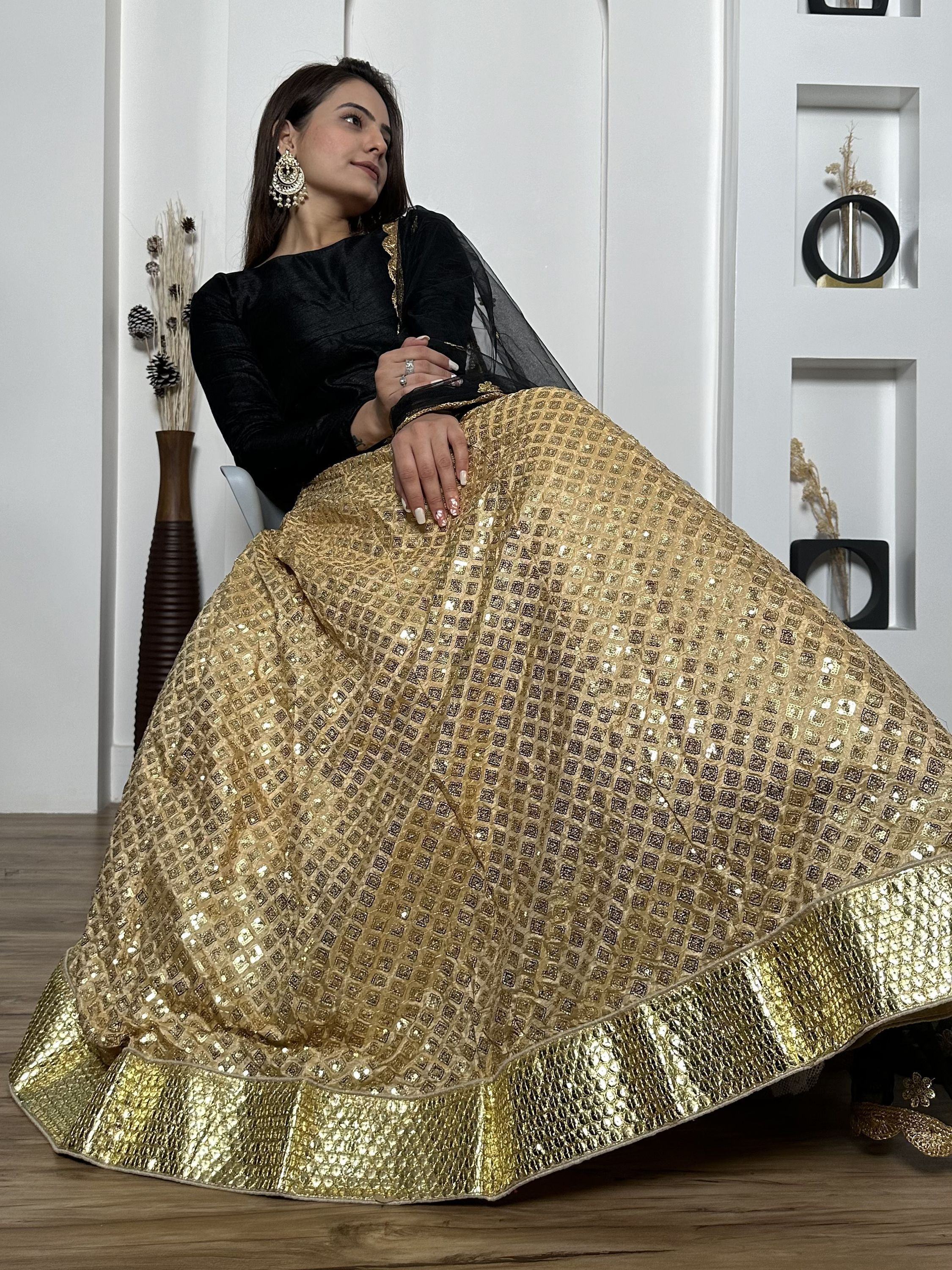 Black and gold sequin lehenga choli with sheer dupatta, Indian ethnic wear for weddings and parties