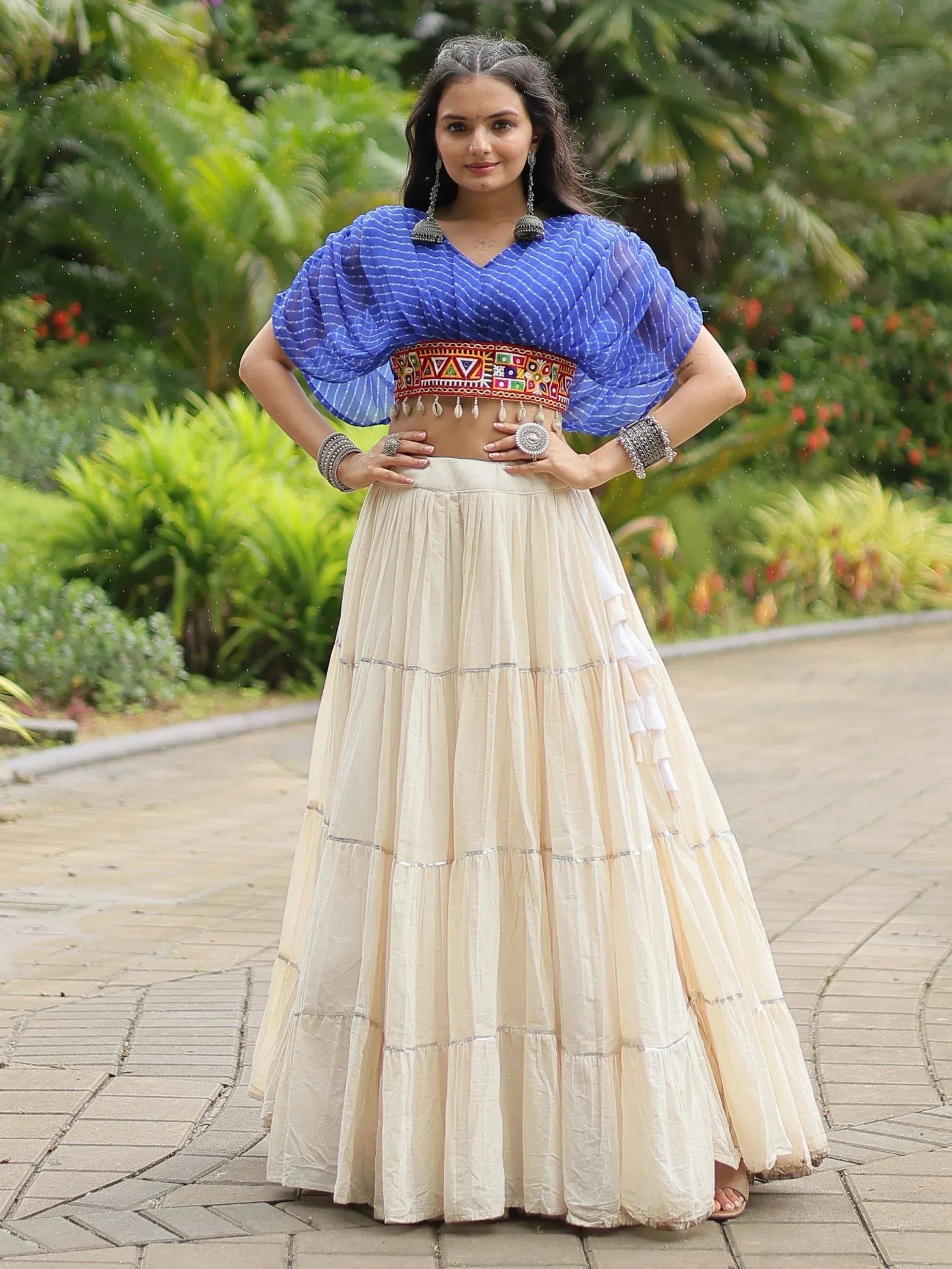 Blue printed crop top with embroidered waistband and cream tiered skirt, Indian ethnic wear