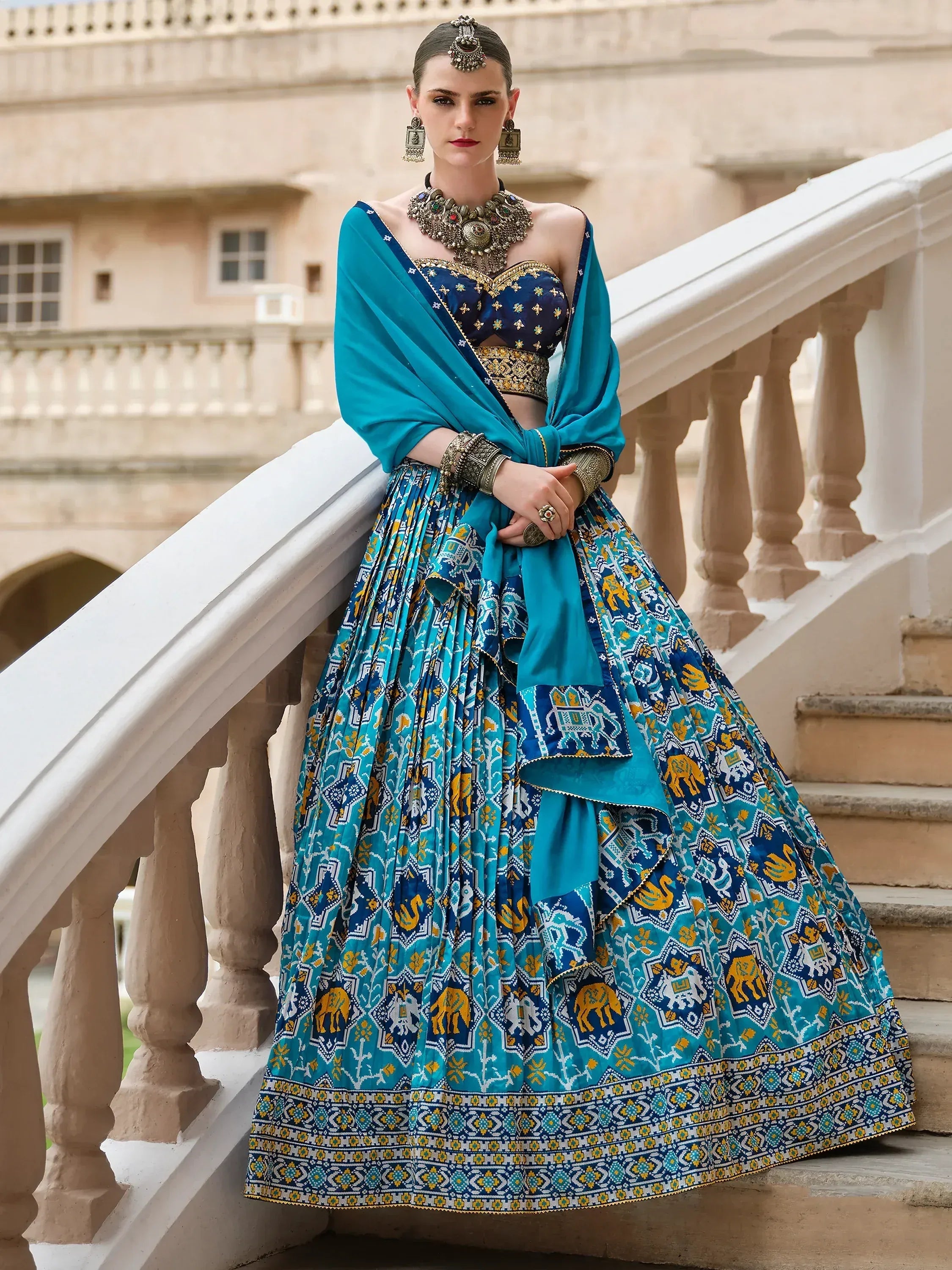 Blue and teal printed lehenga choli with elephant motifs, traditional Indian ethnic wear for women