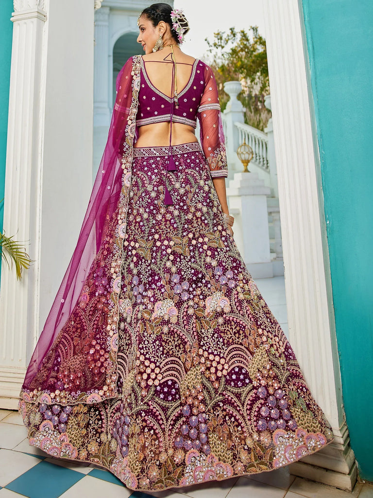 Elegant purple lehenga choli with floral embroidery and sheer dupatta, perfect for Indian weddings and festive occasions.