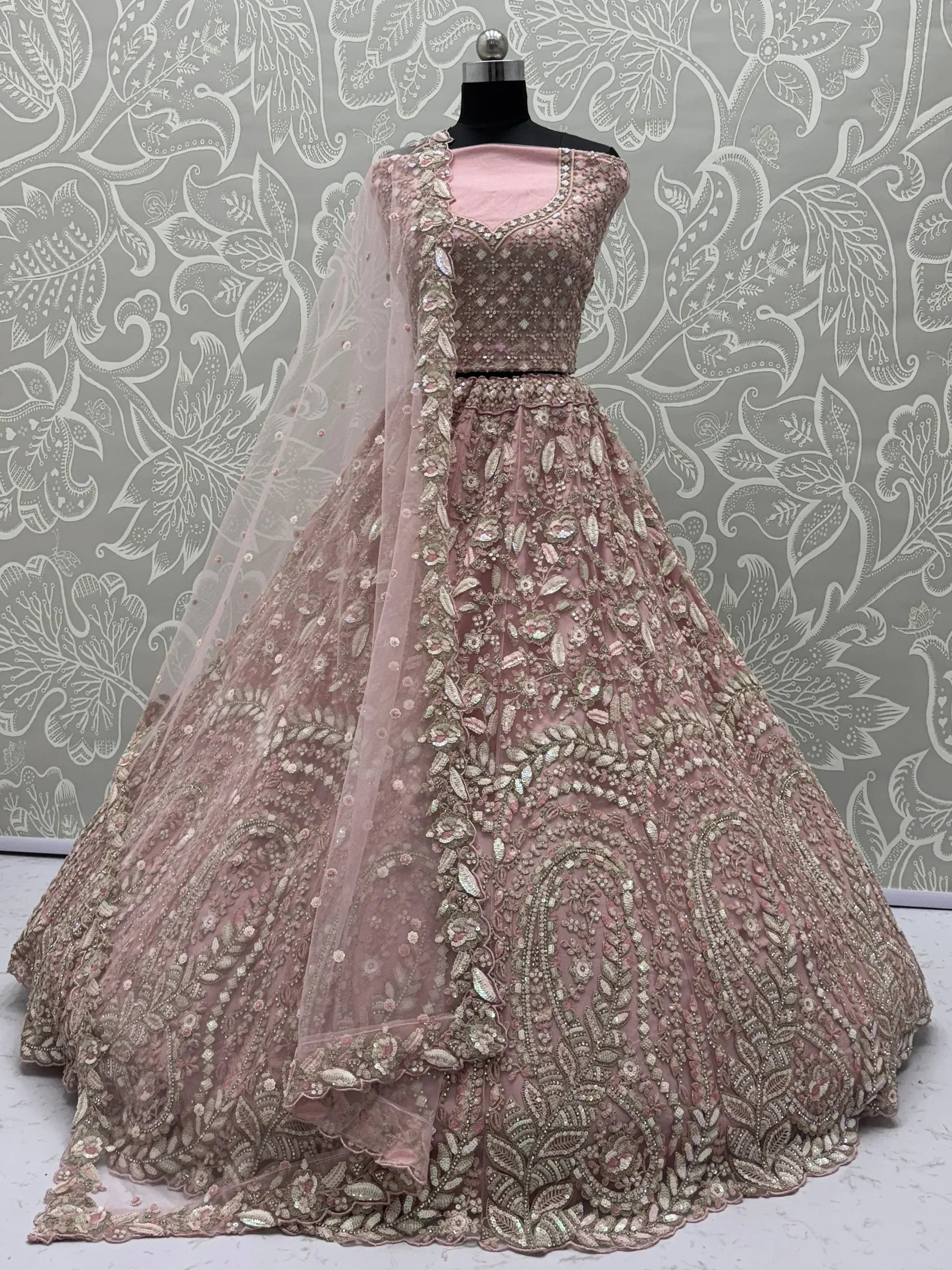 Pink designer lehenga choli with heavy embroidery and net dupatta, ethnic Indian wear