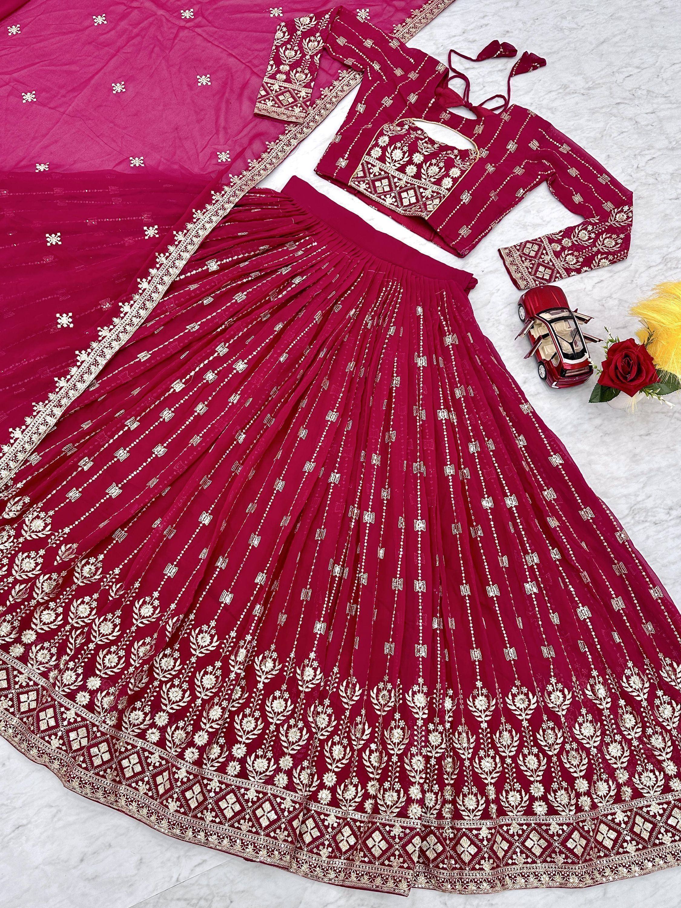 Maroon embroidered lehenga choli with gold floral motifs, pleated skirt, and matching dupatta for Indian ethnic wear