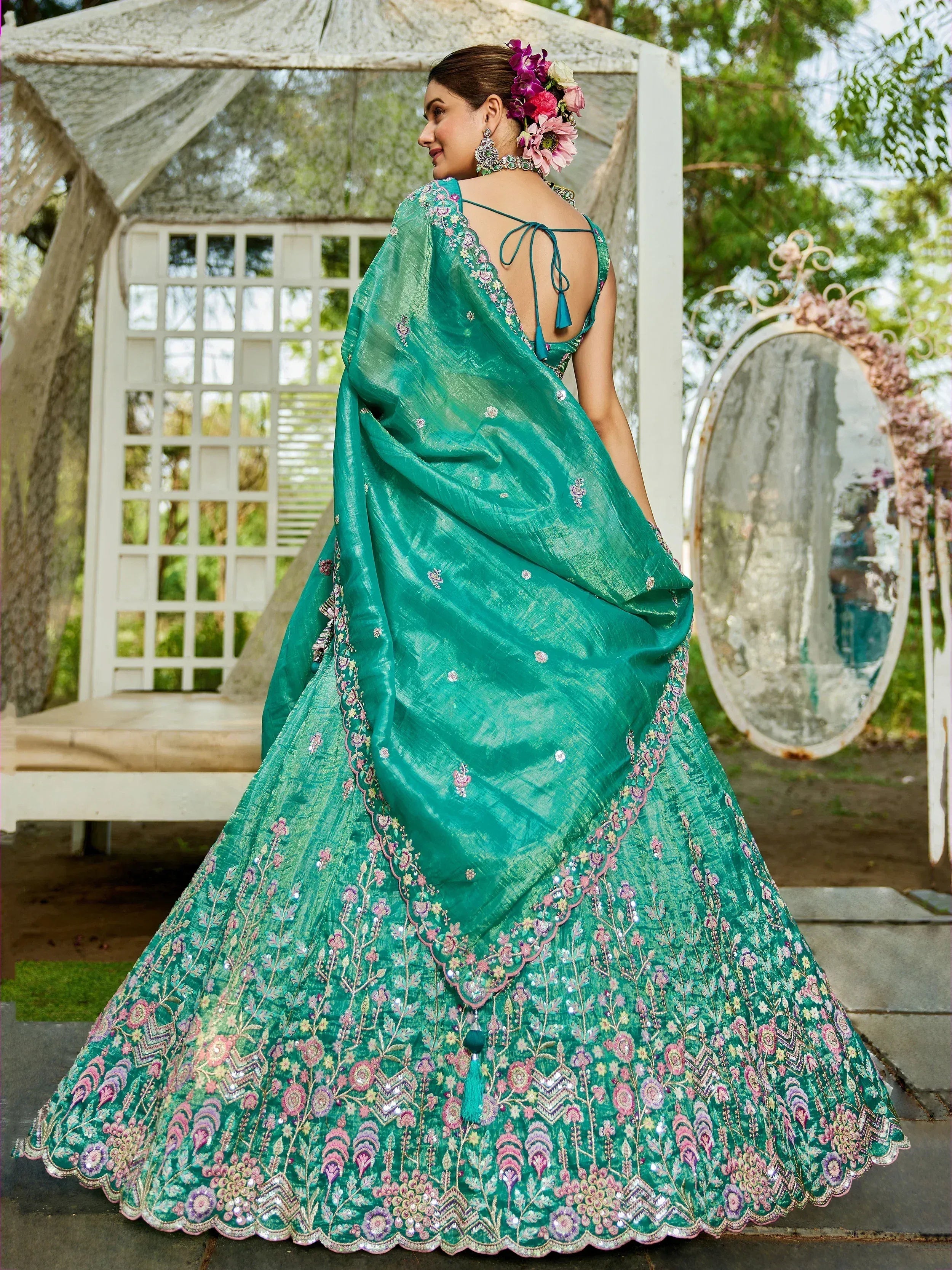Teal designer lehenga choli with floral embroidery, perfect for Indian ethnic wear occasions