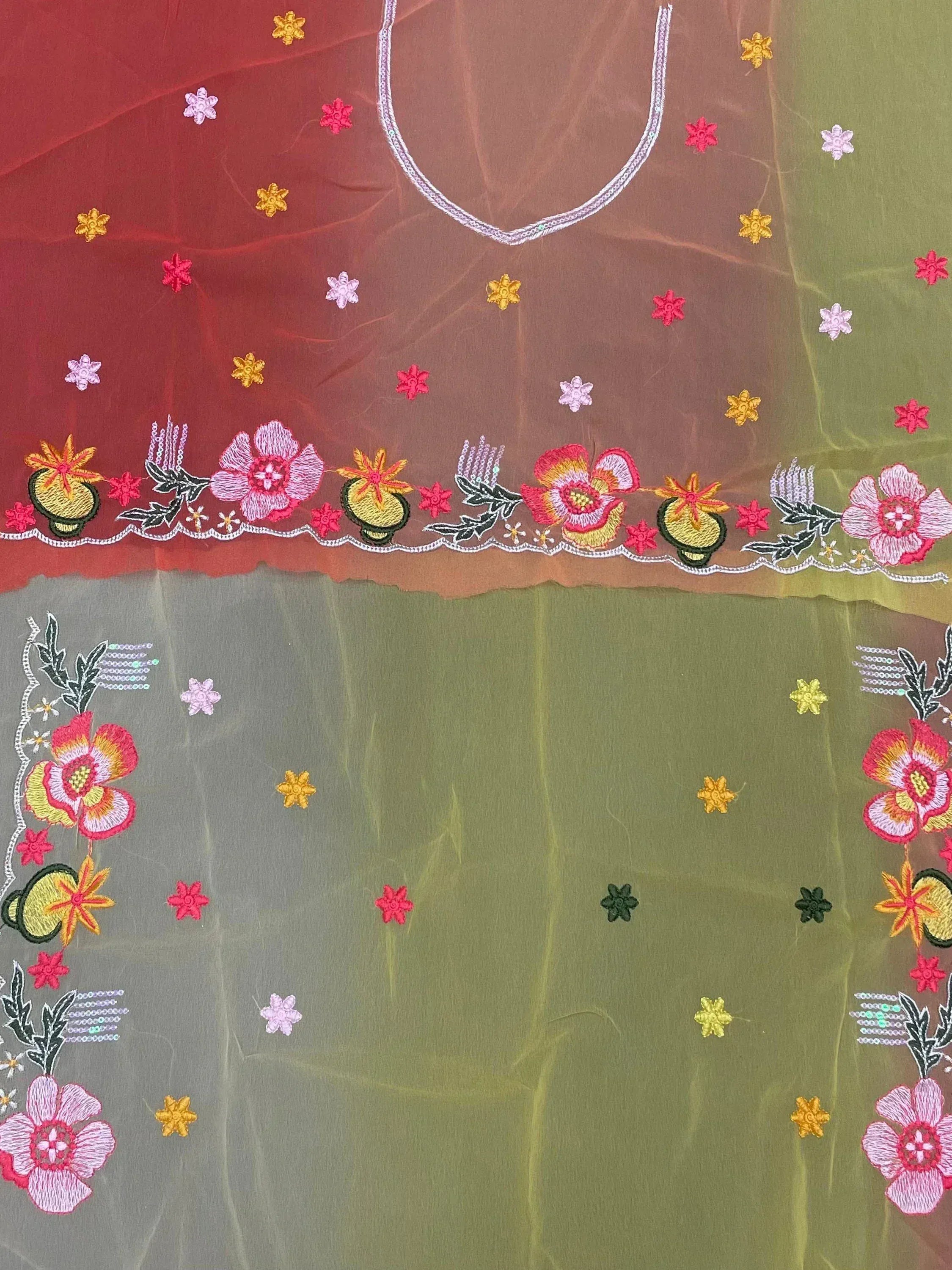 Colorful embroidered ethnic top with floral and pot motifs, perfect for Indian wear