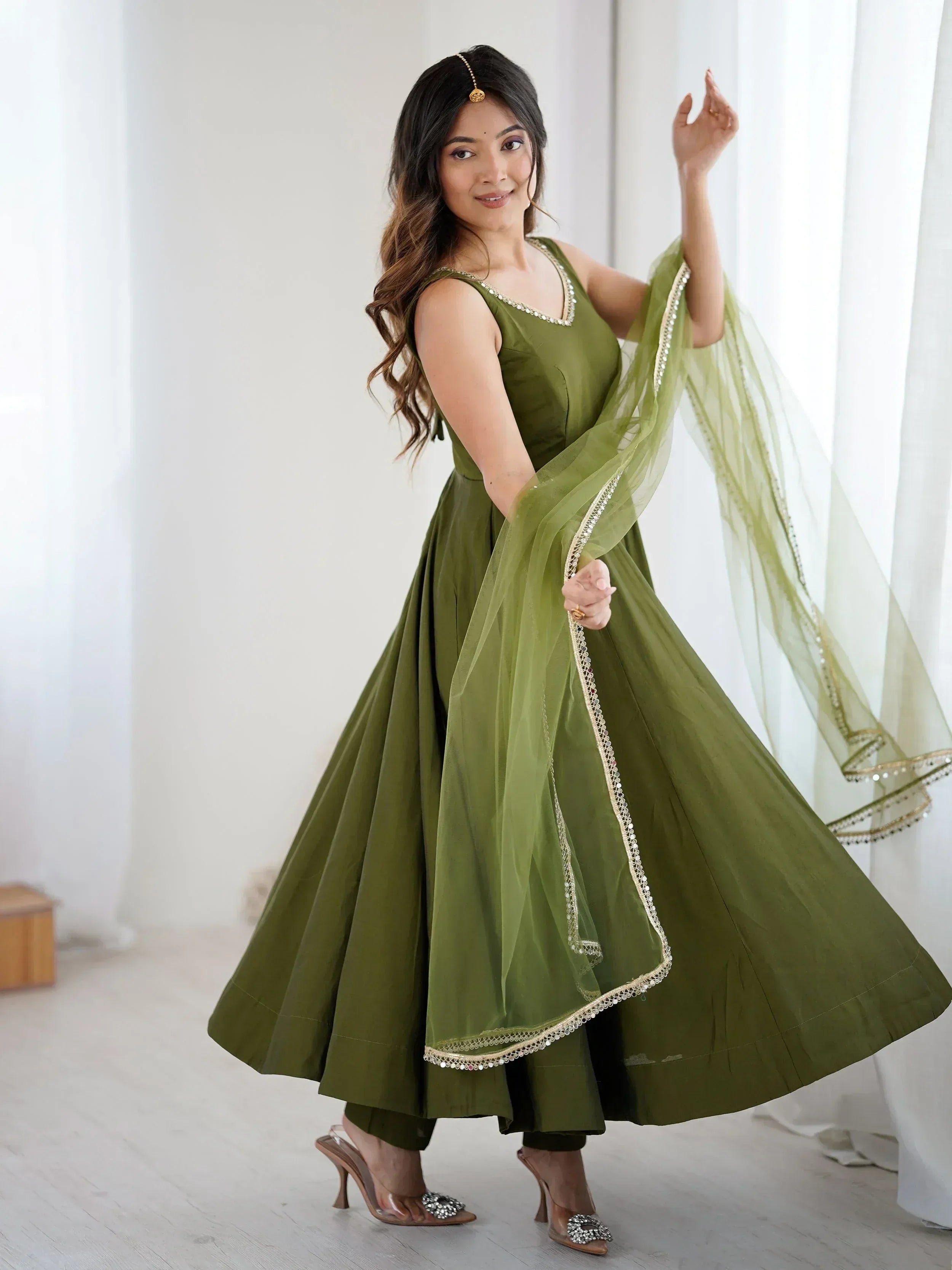 Olive green ethnic anarkali suit with gold embroidery and dupatta, perfect for Indian occasions