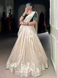 Spectacular Cream Silk Border Work Onam Wear Half Saree Lehenga