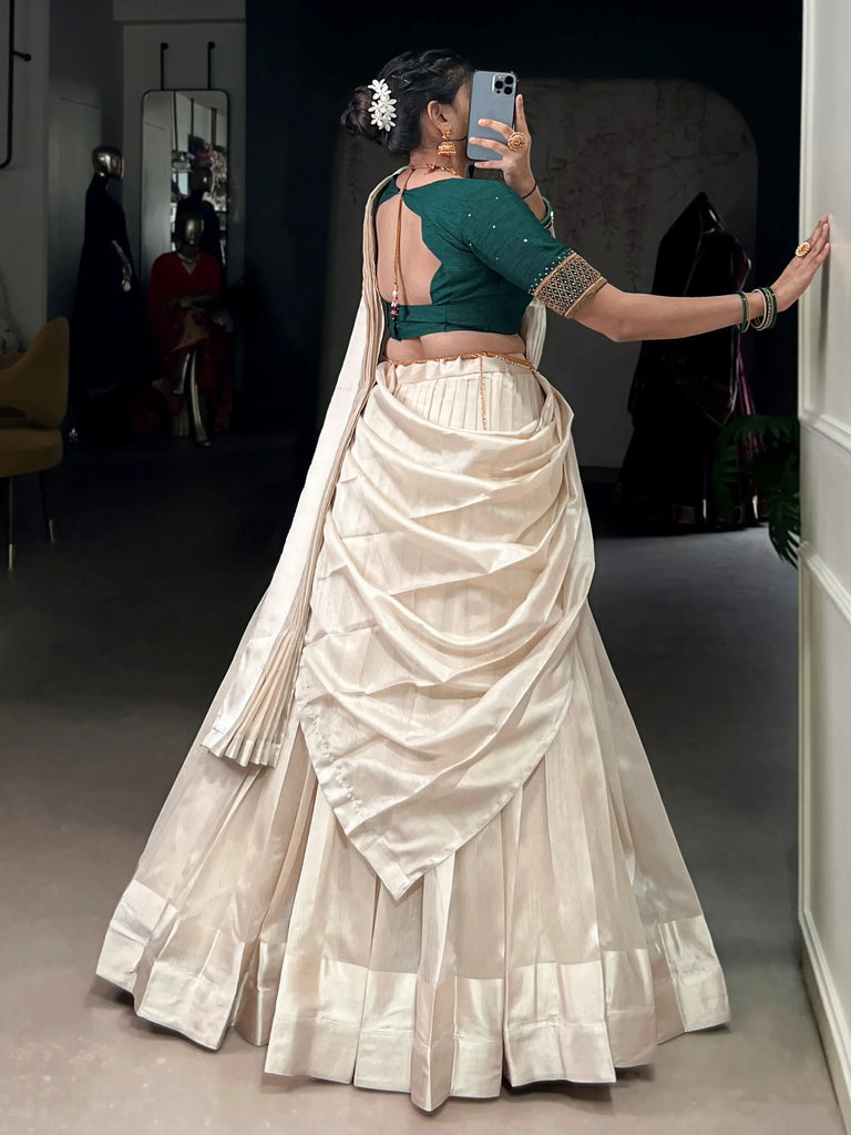 Spectacular Cream Silk Border Work Onam Wear Half Saree Lehenga