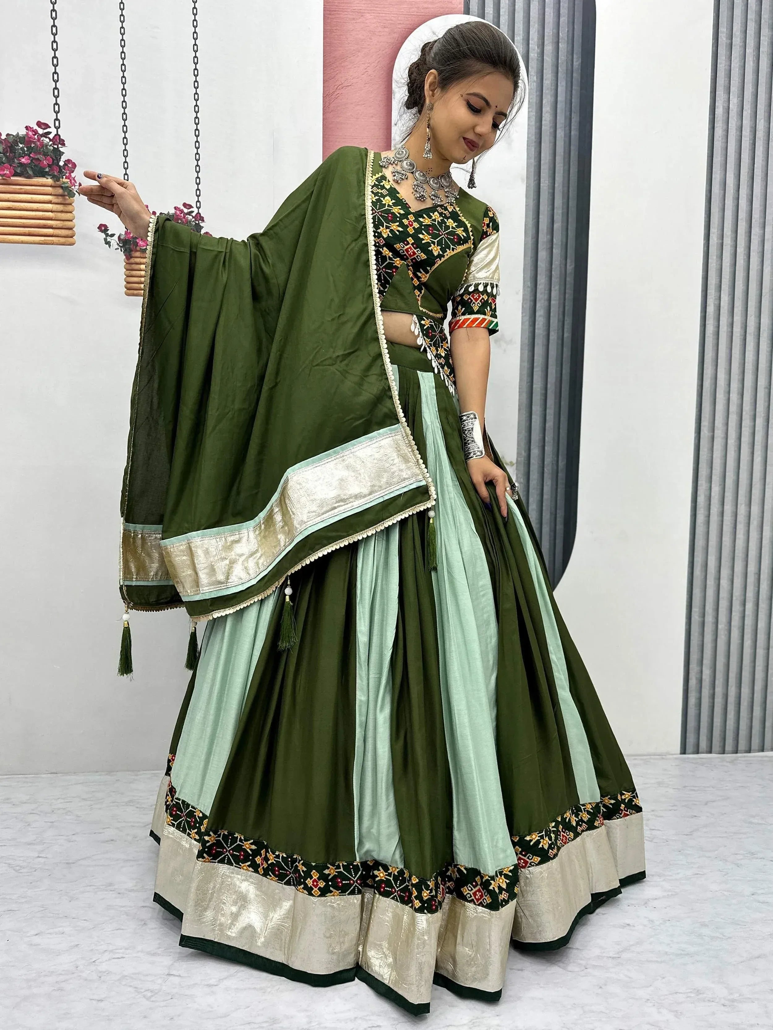 Olive green and mint lehenga choli with embroidered blouse and dupatta, perfect for Indian ethnic wear occasions.