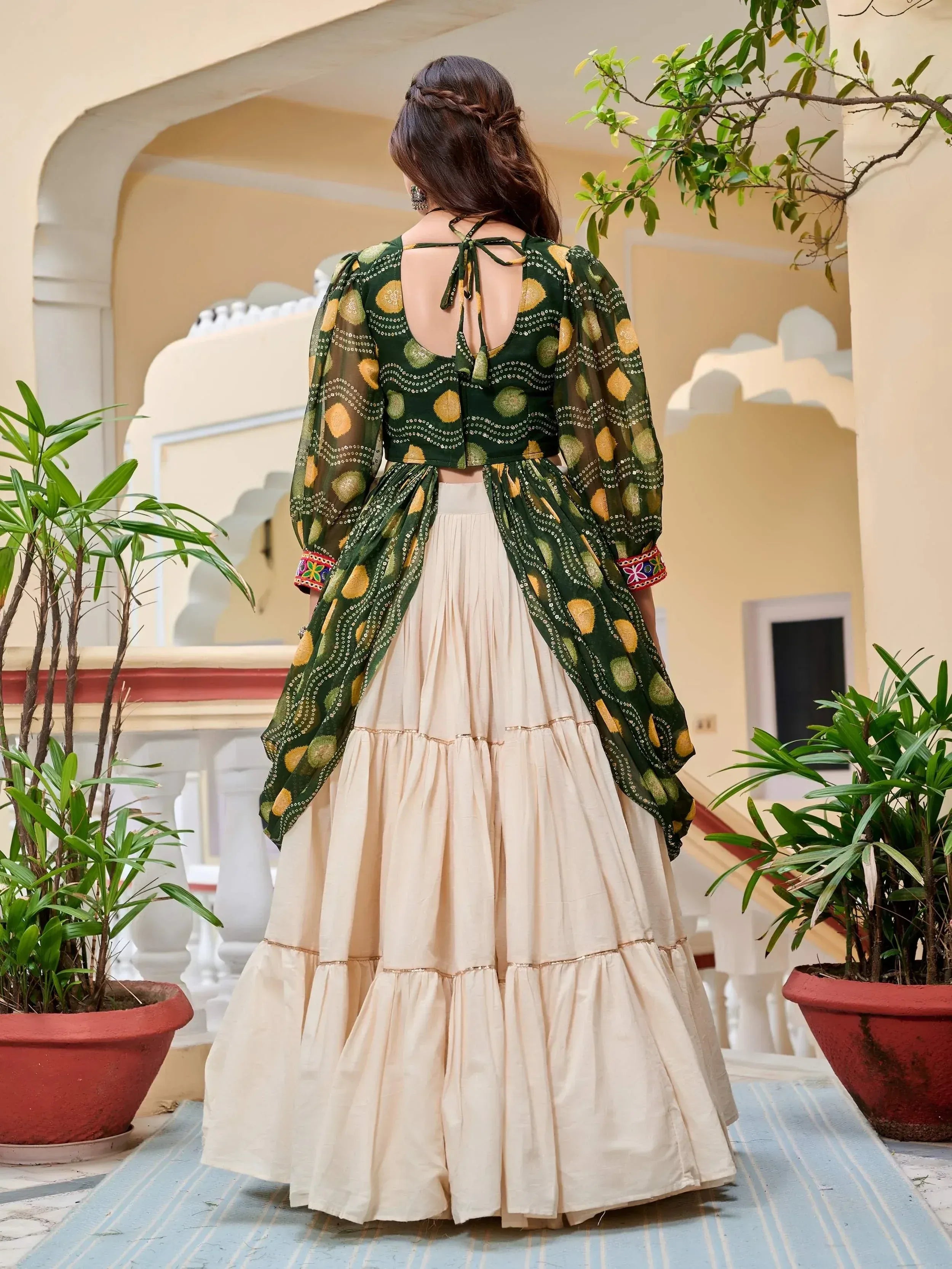 Green printed crop top with sheer sleeves and cream tiered skirt, Indian ethnic wear
