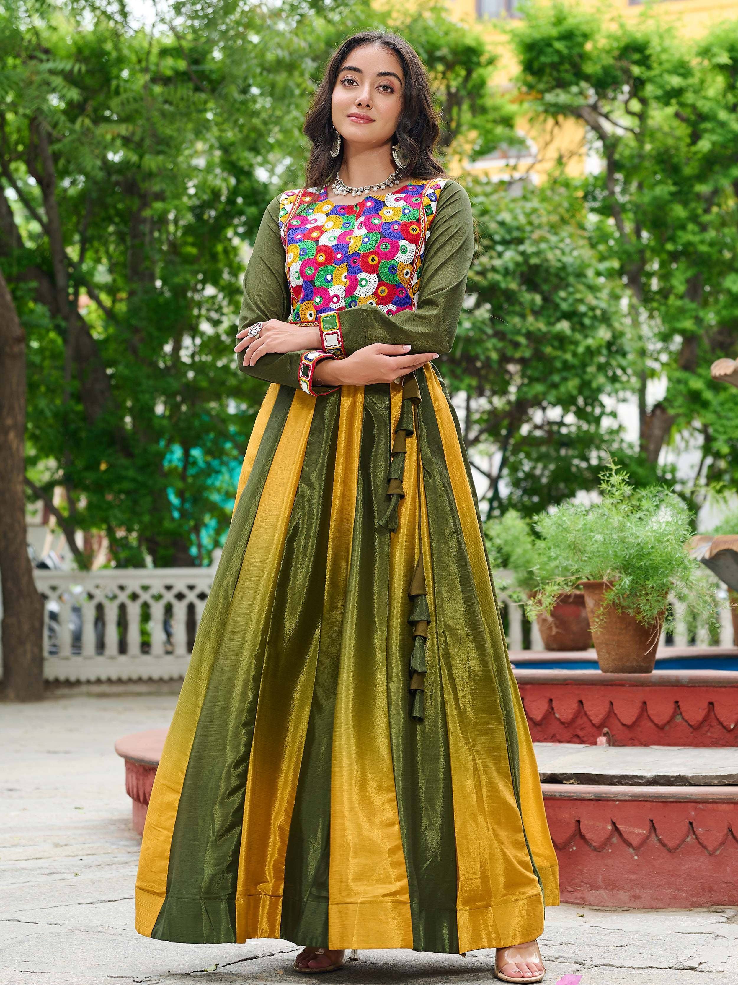 Olive and mustard Indian ethnic gown with colorful floral embroidery, perfect for festive occasions.