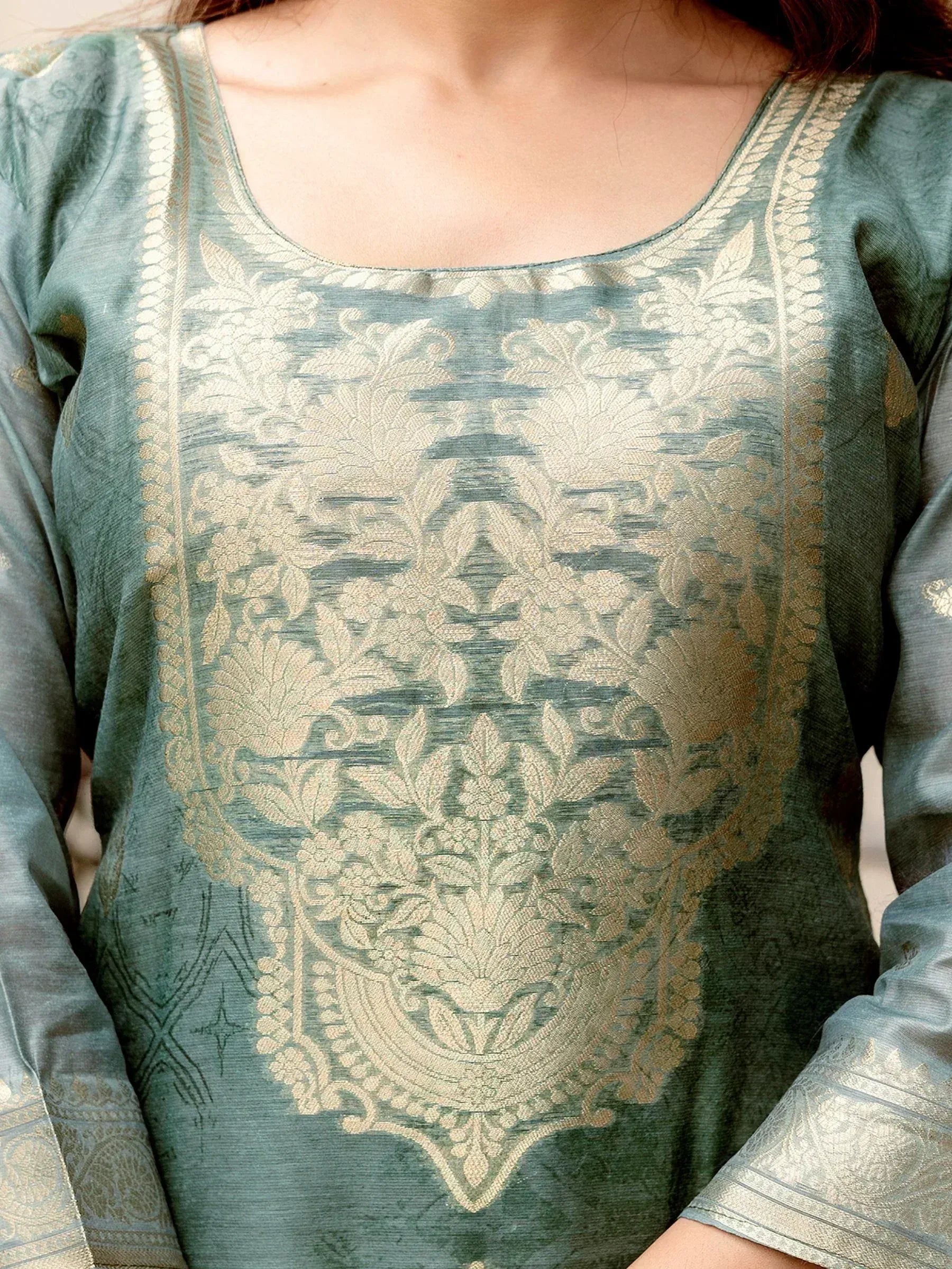 Elegant teal ethnic kurti with gold floral embroidery and scalloped neckline, perfect for Indian wear.