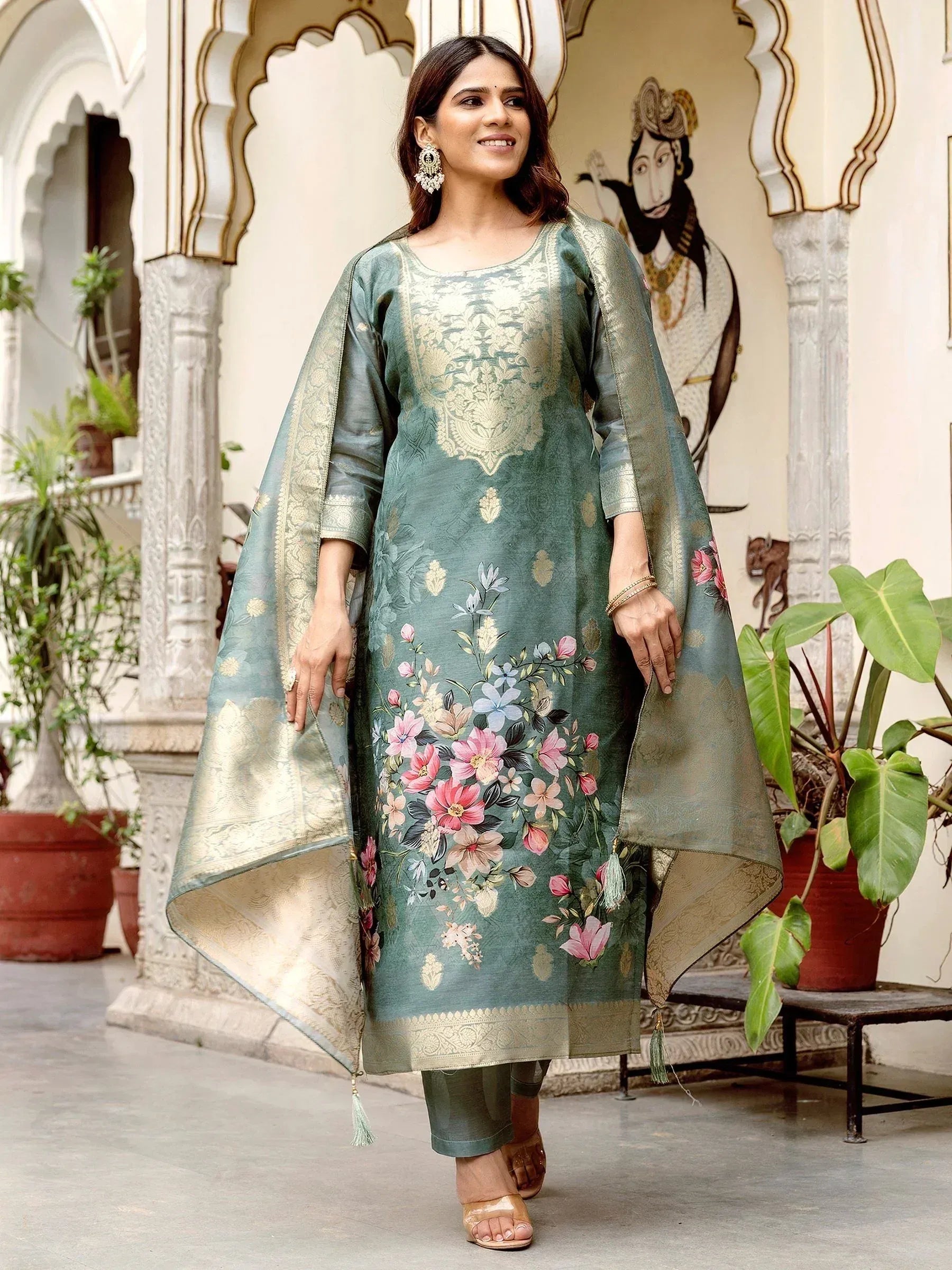 Green floral printed Indian salwar kameez with gold embroidery and matching dupatta, perfect for ethnic occasions