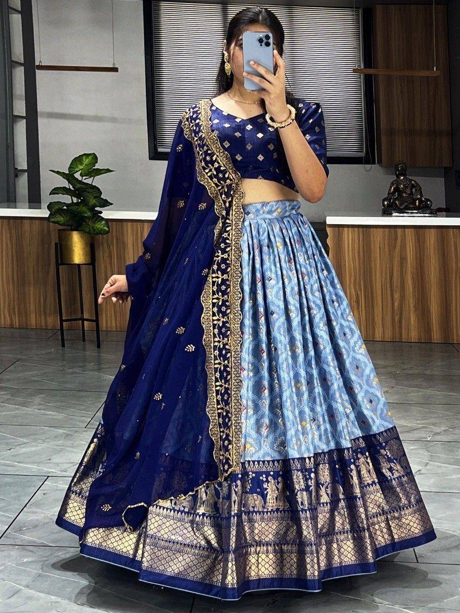 Blue and gold designer lehenga choli with embroidered dupatta, perfect for Indian ethnic wear occasions