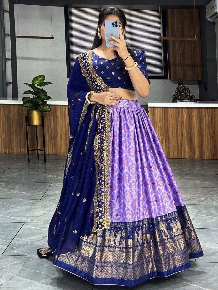 Purple and navy blue lehenga choli with gold embroidery, perfect for Indian ethnic occasions