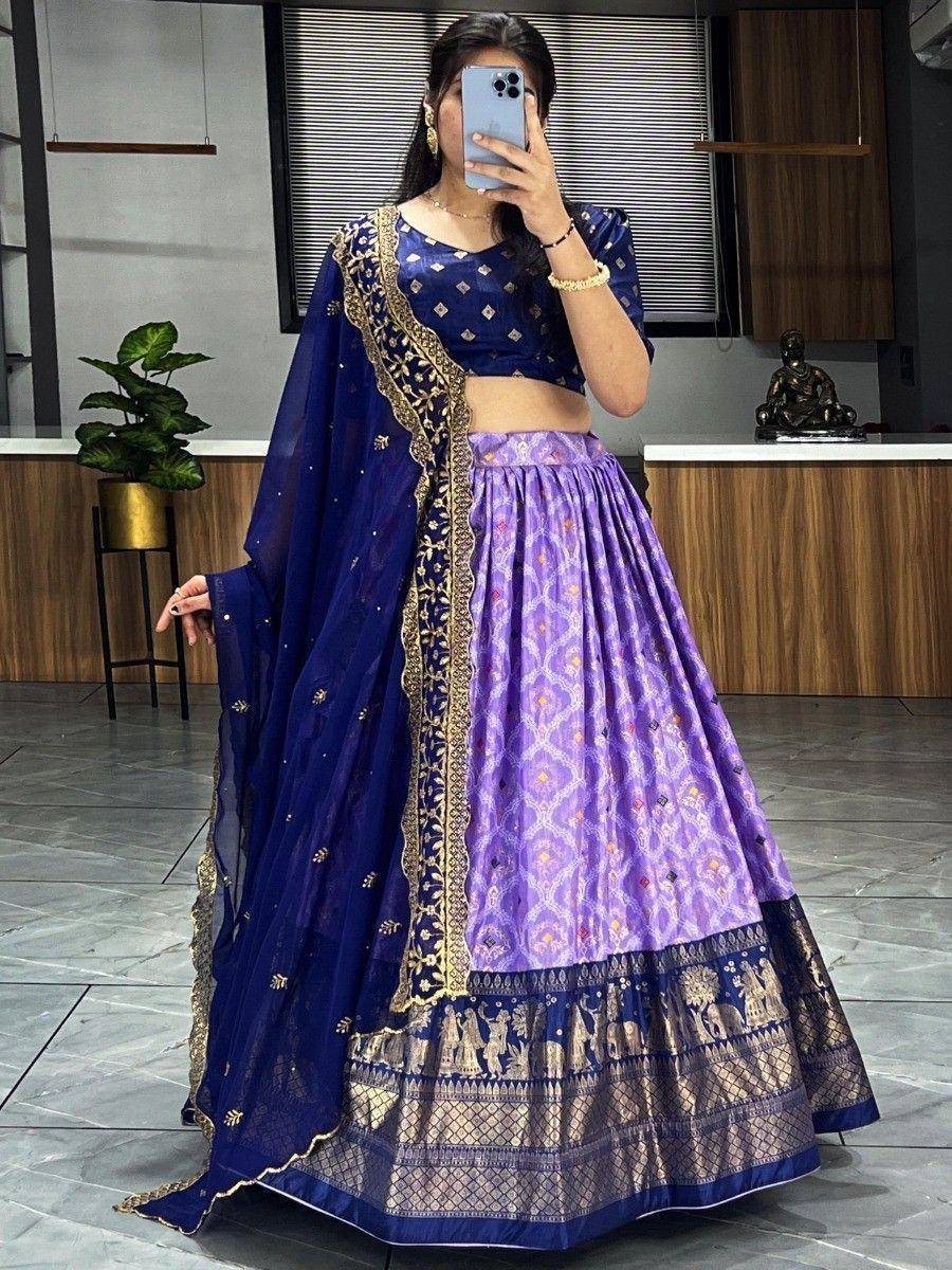 Purple and navy blue designer lehenga choli with gold embroidery, perfect for Indian ethnic occasions