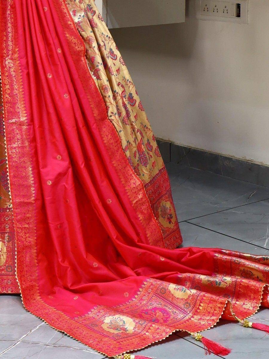 Vibrant red Indian saree with gold floral border and tassels, ethnic wear for festive occasions