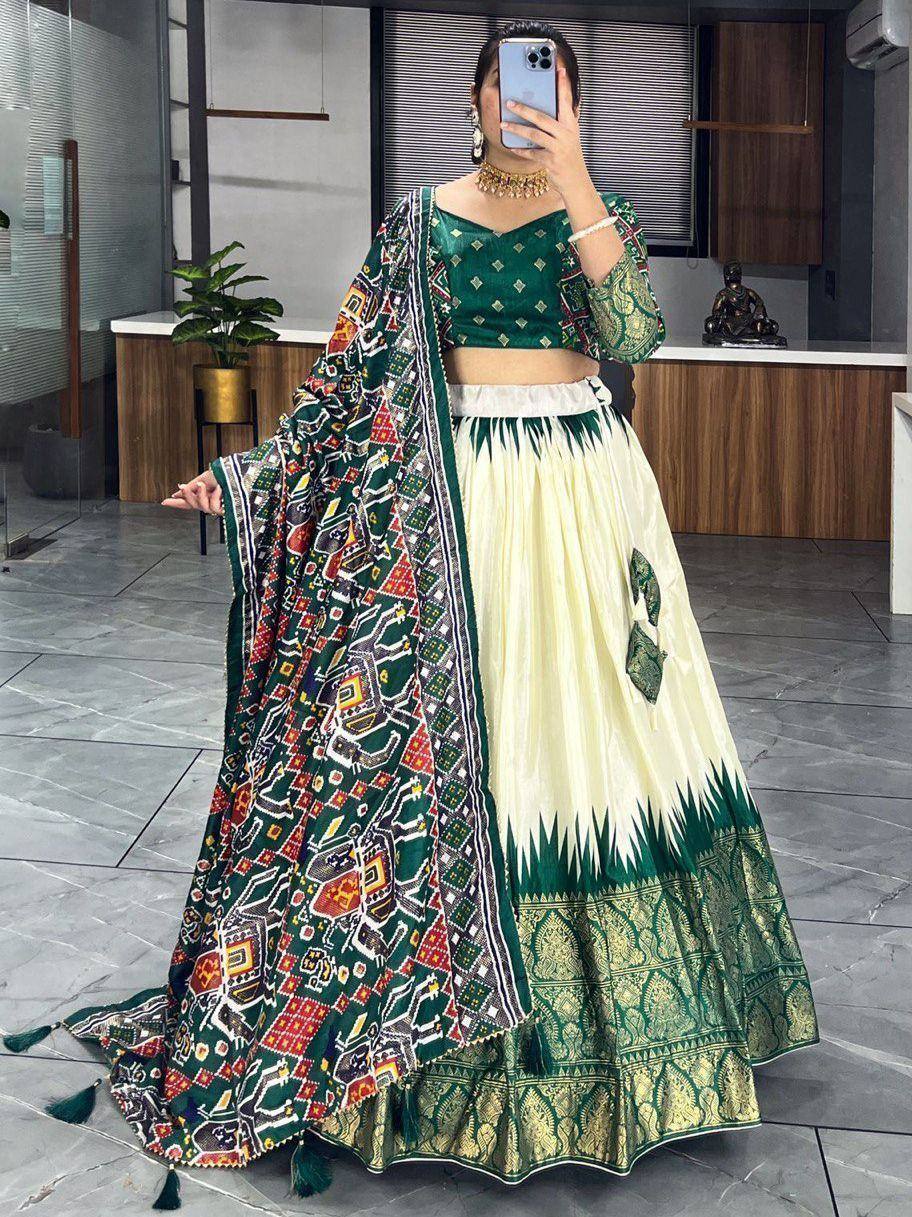 Green and cream printed lehenga choli with ethnic dupatta, perfect for Indian weddings and festive occasions