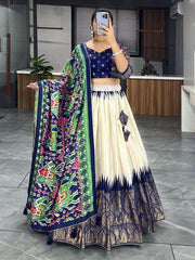 Stunning Off-White & Navy Blue Patola Printed Dola Silk Lehenga Choli