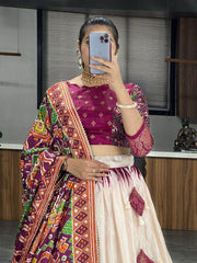 Gorgeous Off-White & Wine Patola Printed Dola Silk Lehenga Choli