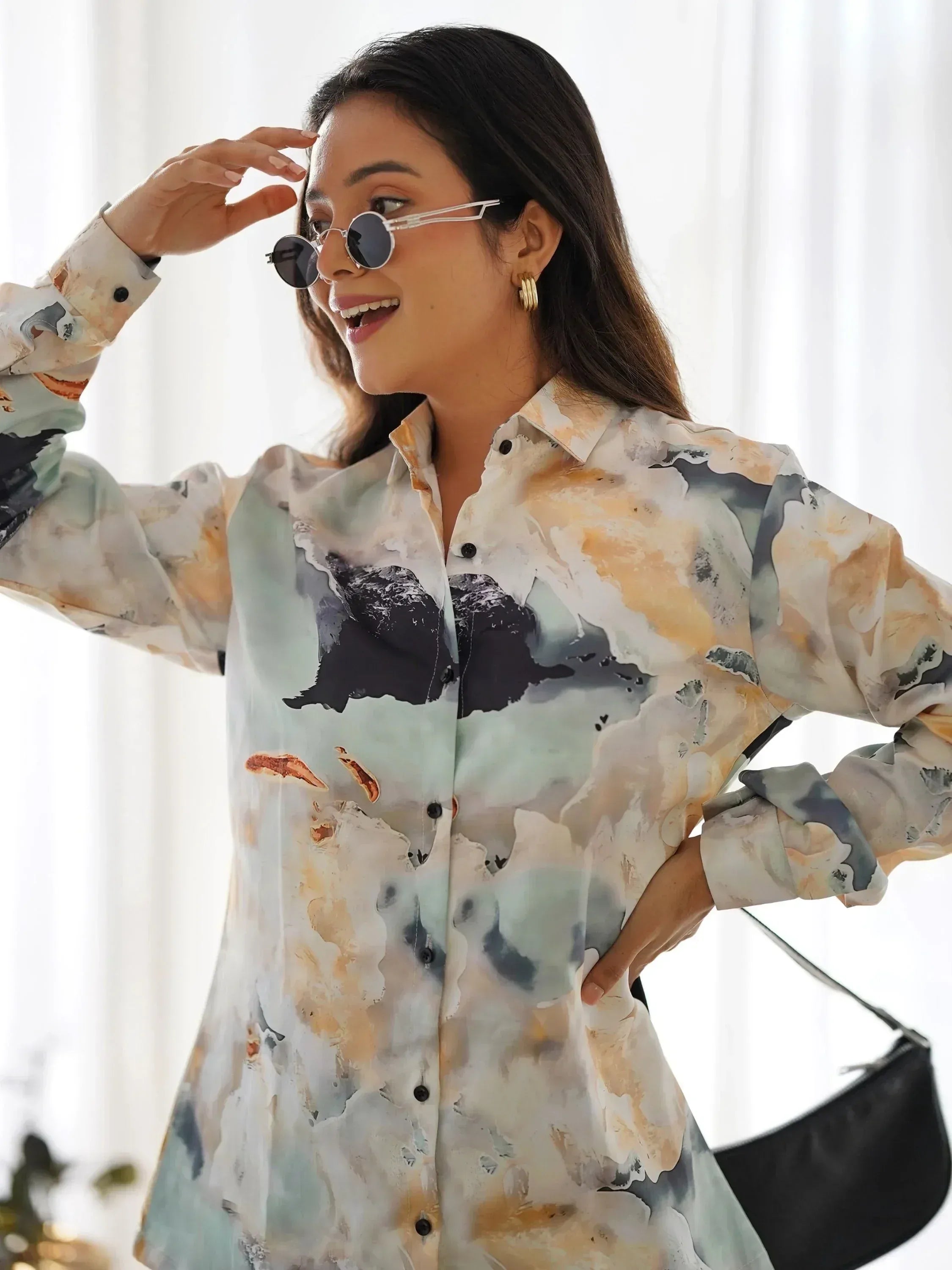 Woman in stylish printed ethnic shirt dress with sunglasses, perfect for casual or semi-formal occasions.