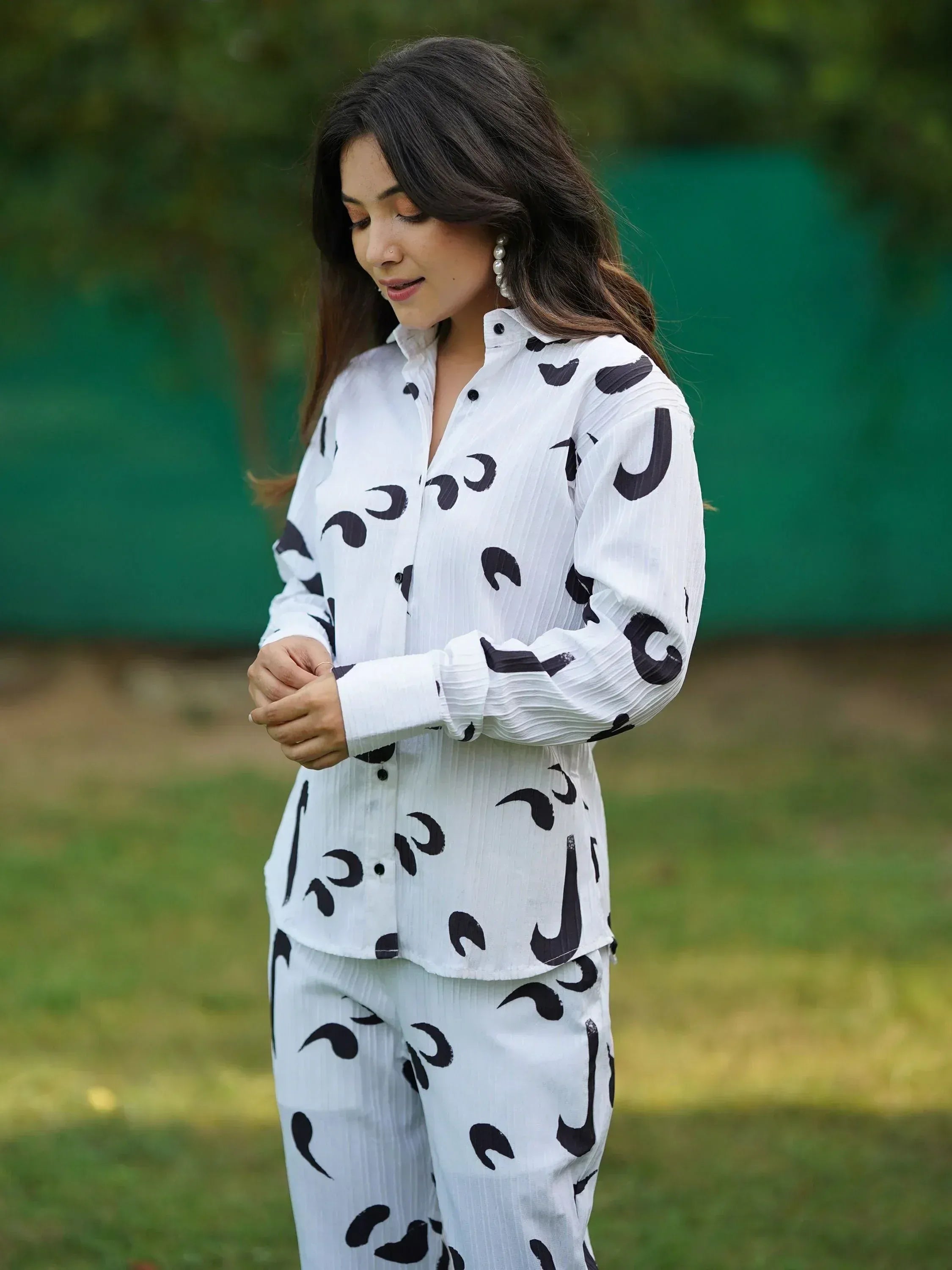 White and black printed ethnic kurta set with abstract pattern, perfect for casual wear