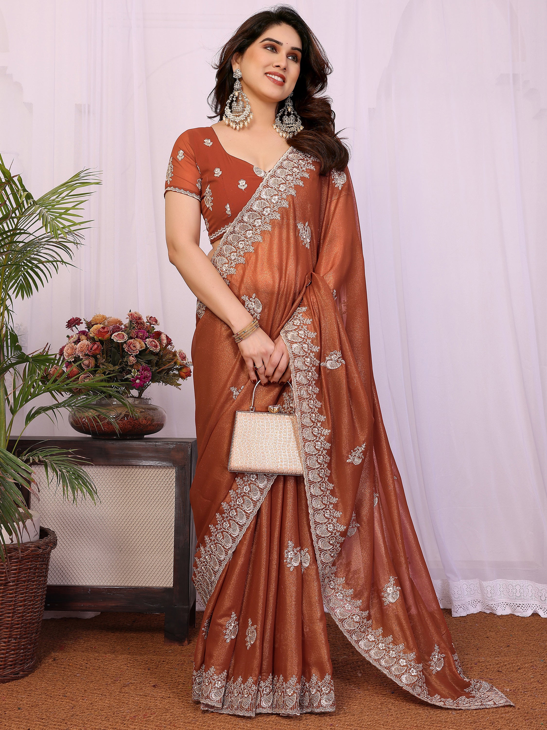 Awesome Brown Zari Embroidered Georgette Saree With Blouse
Rich text editor

