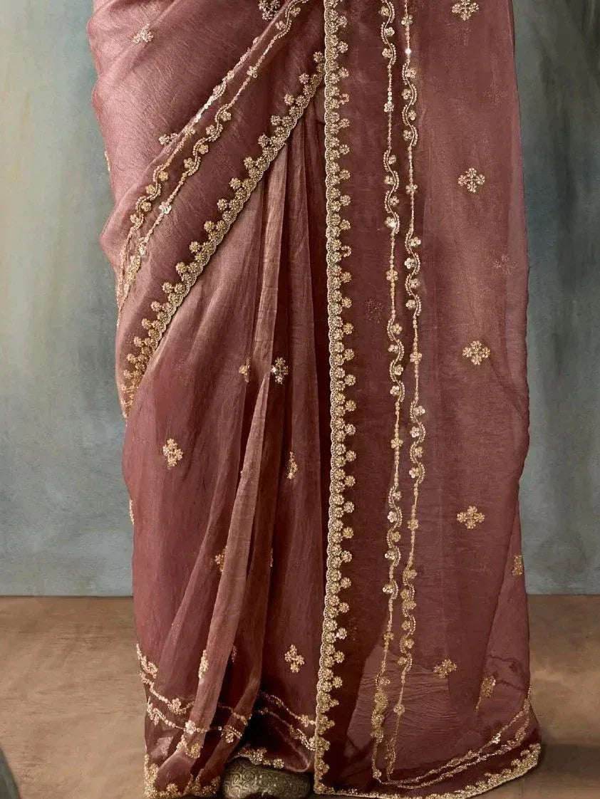 Elegant mauve saree with gold floral embroidery and border detailing, perfect for Indian ethnic occasions.