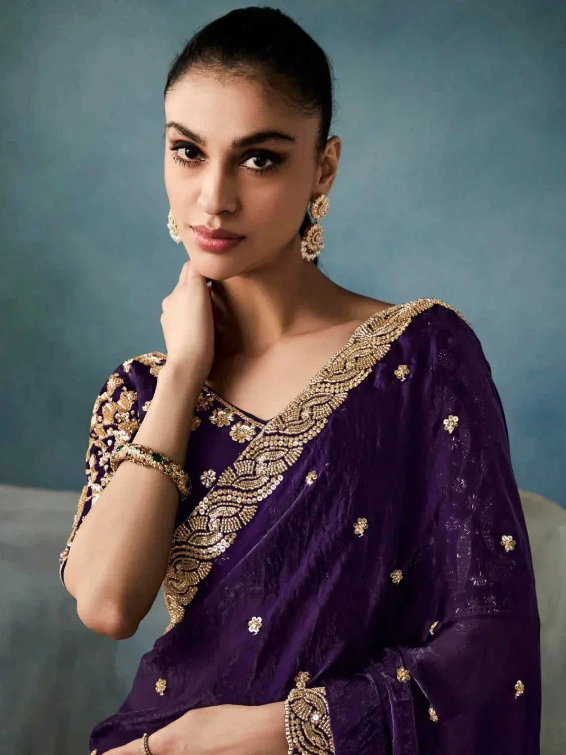 Purple velvet saree with gold embroidery, perfect for Indian ethnic wear and festive occasions