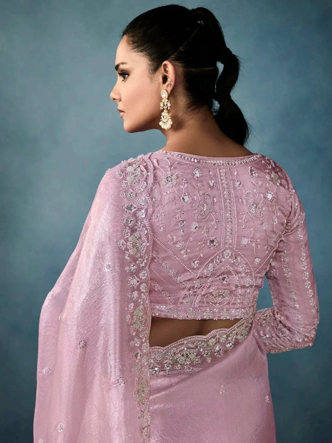 Pink embroidered designer salwar kameez with back cutout and matching dupatta, perfect for ethnic occasions
