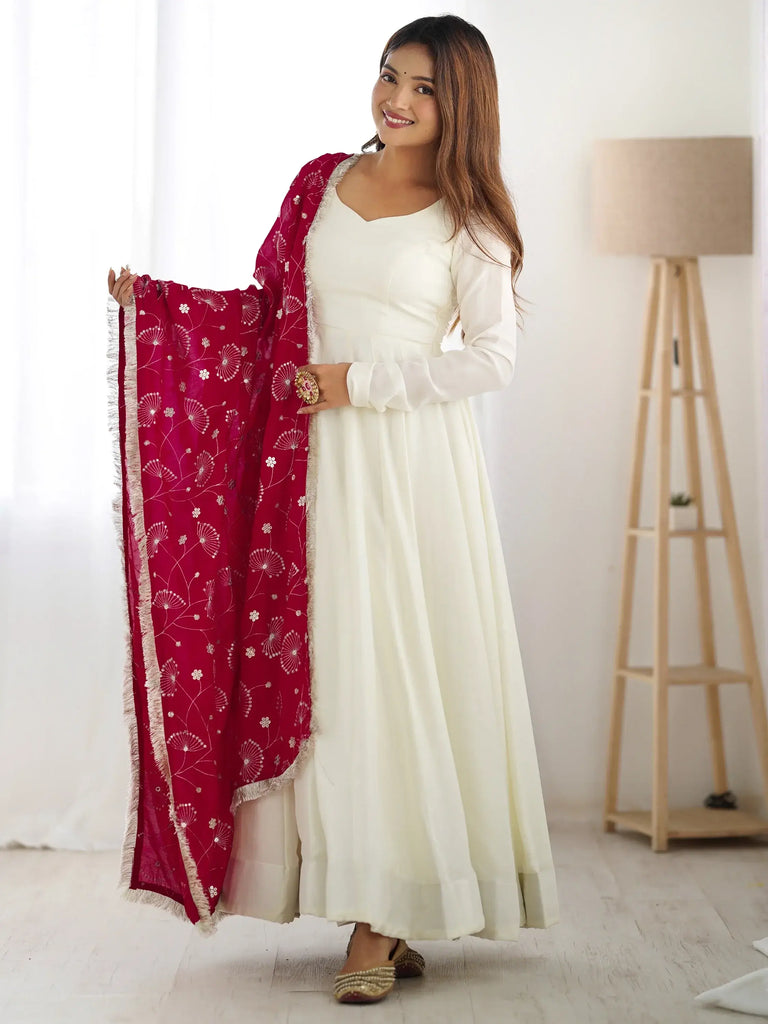 Adorable Off-White Silk Anarkali Gown With Heavy Pink Dupatta