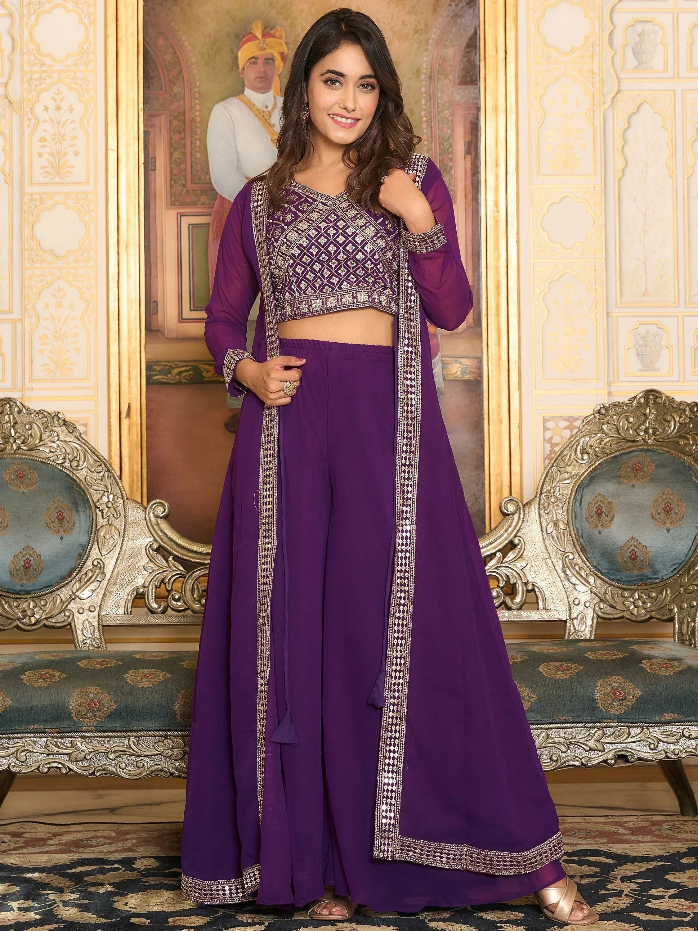 Woman in purple embroidered lehenga choli set, traditional Indian ethnic wear