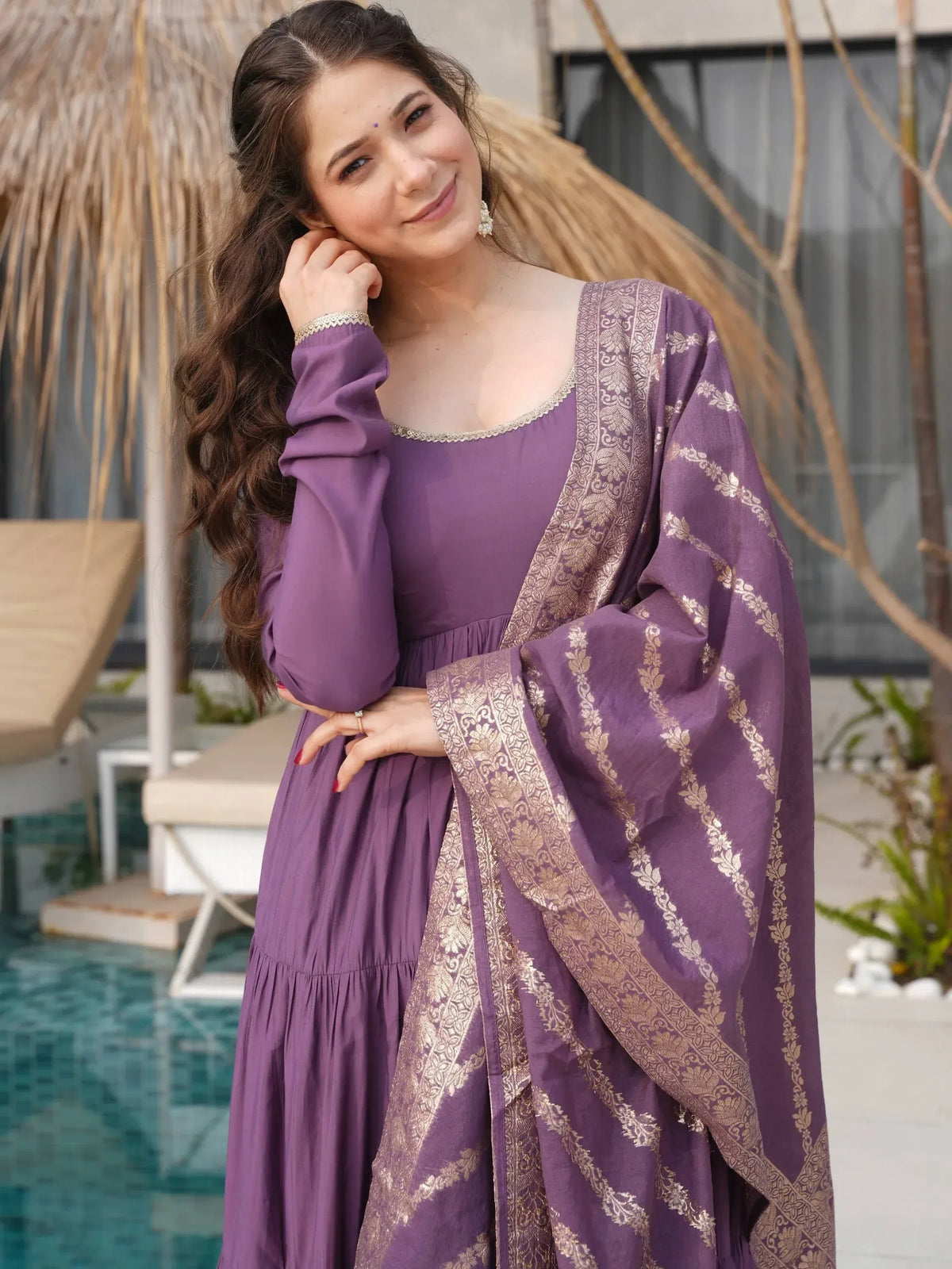Purple ethnic gown with gold embroidery, perfect for Indian occasions and festive wear
