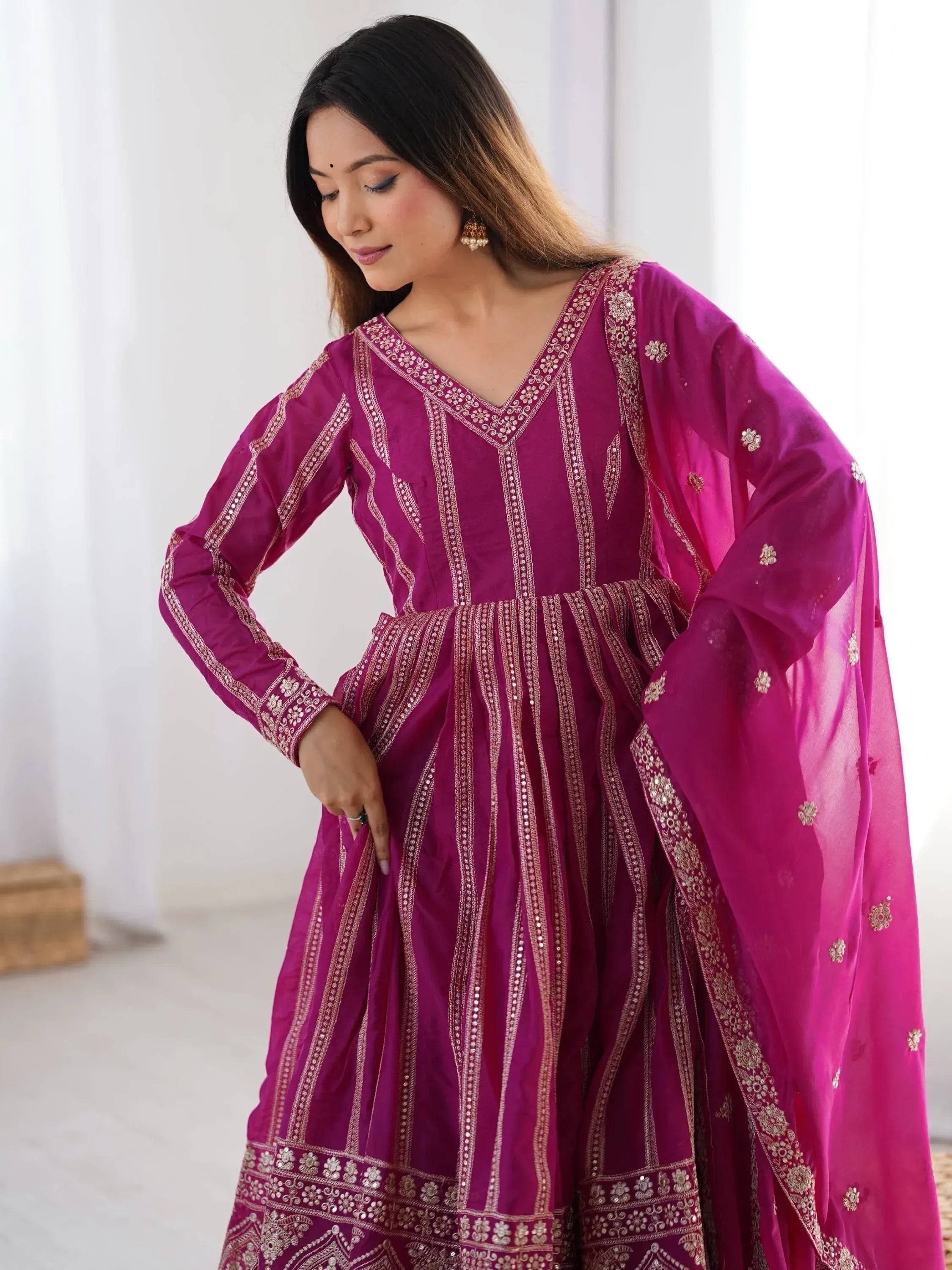Purple ethnic anarkali with gold embroidery and dupatta, perfect for Indian occasions