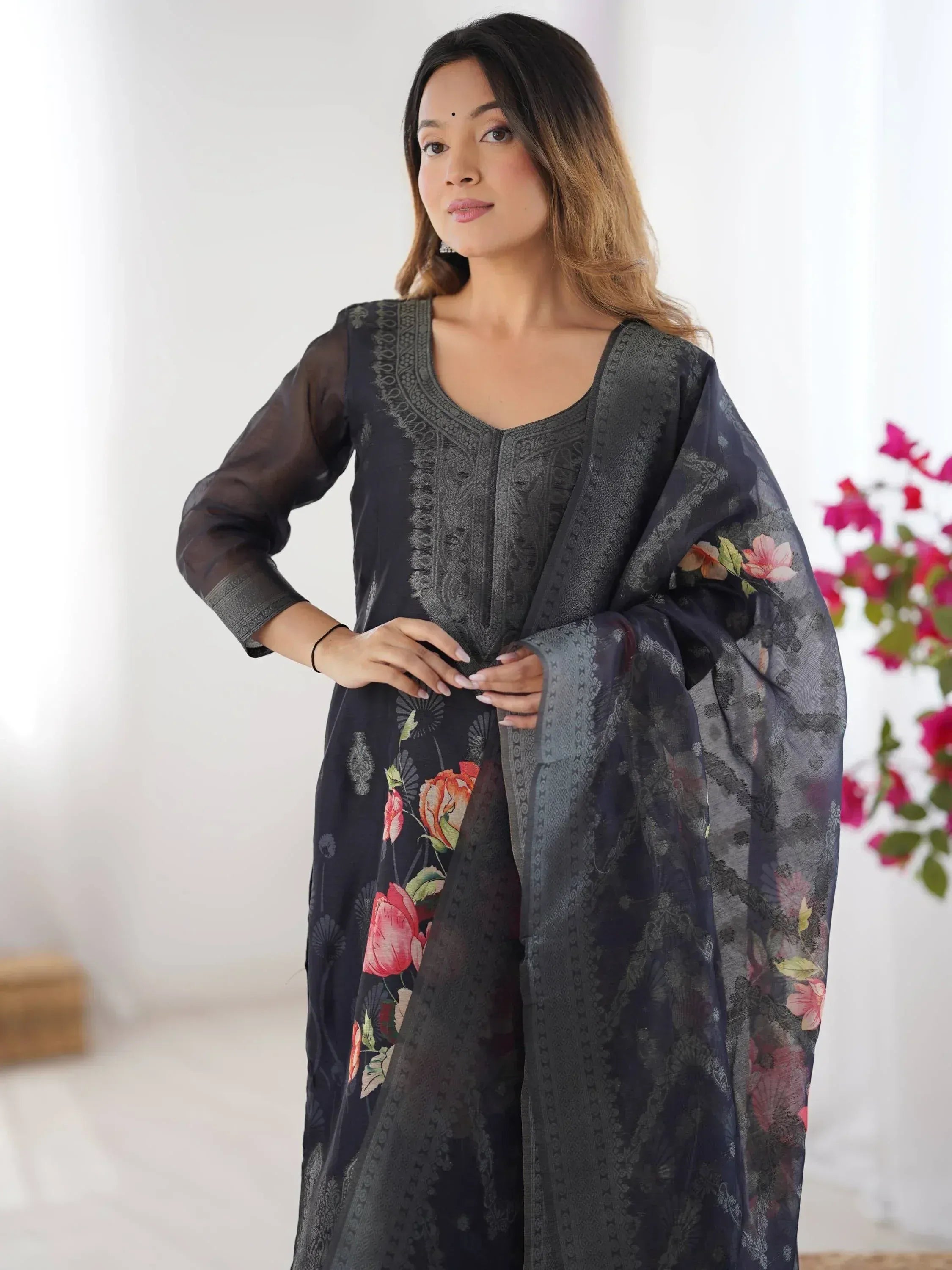 Black floral printed ethnic salwar kameez with sheer dupatta, perfect for Indian occasions