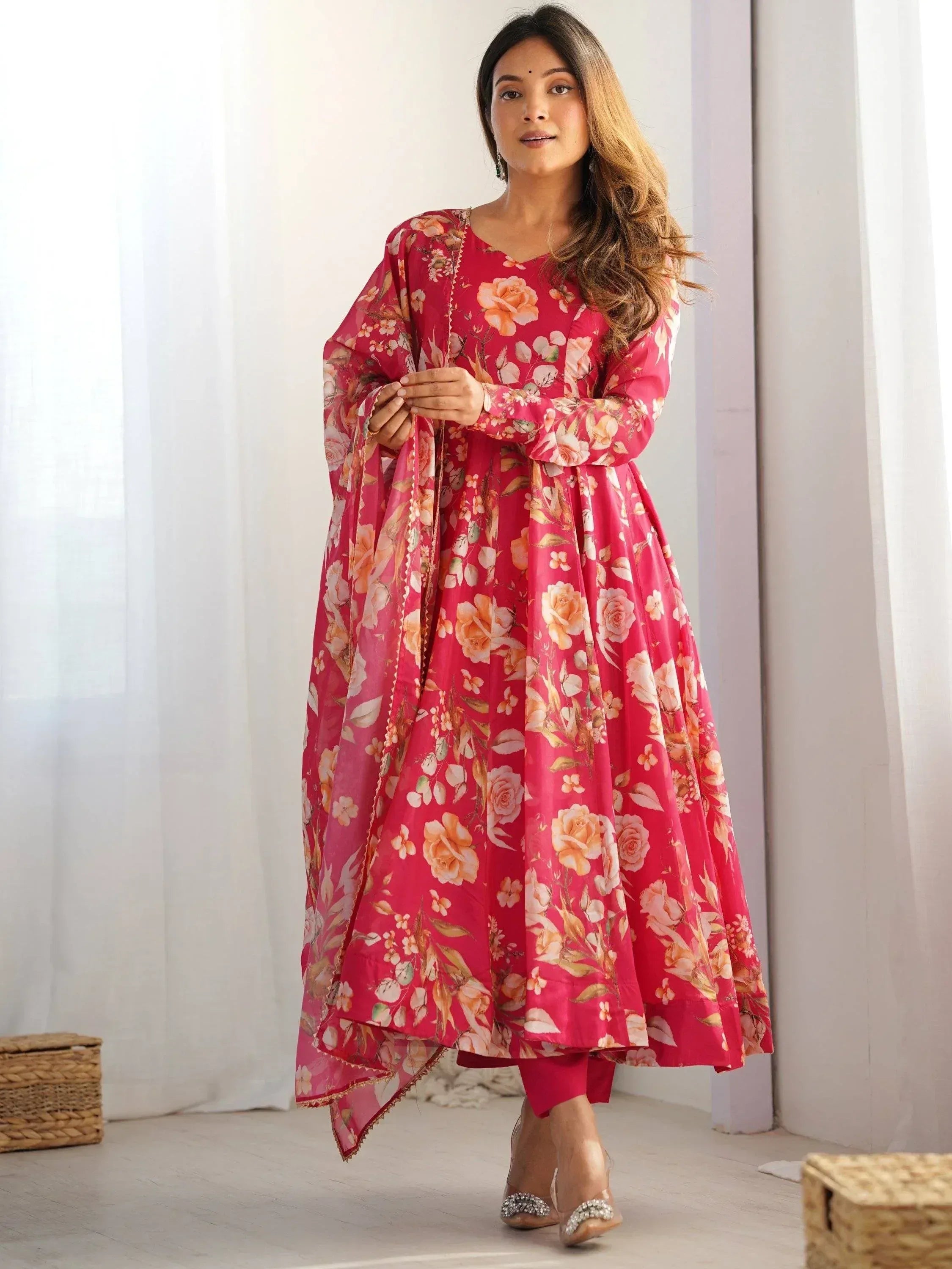 Pink floral print ethnic gown with matching dupatta, perfect for Indian occasions and festive wear.