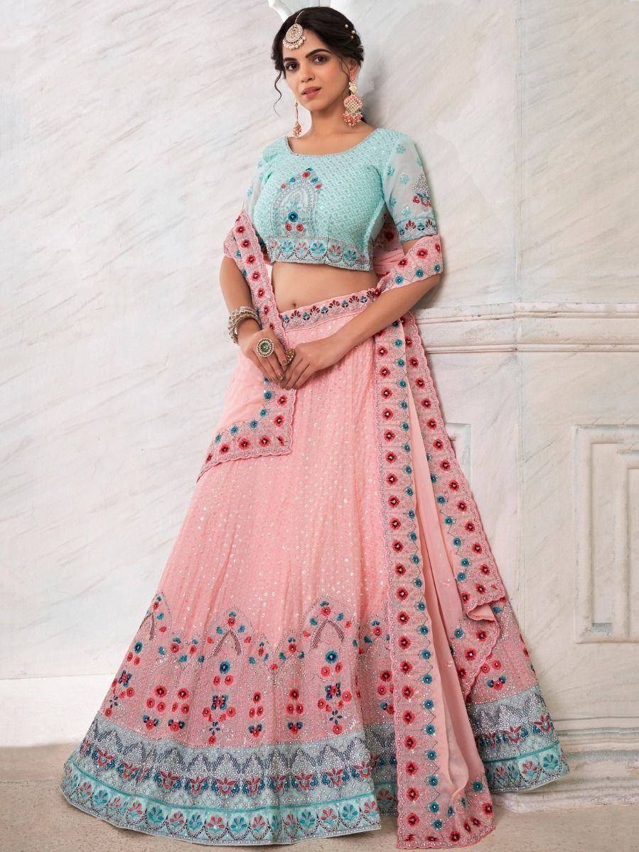 Pink and mint designer lehenga choli with floral embroidery, perfect for Indian ethnic occasions