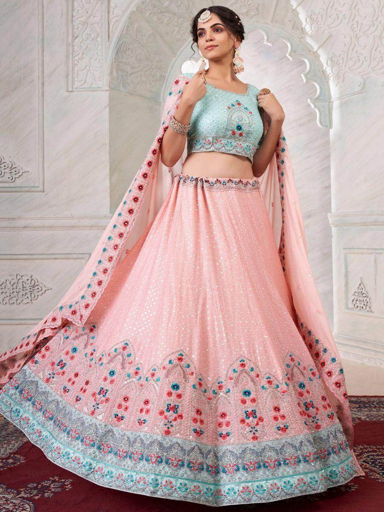 Fascinating Peach Sequined Work Georgette Party Wear Lehenga Choli