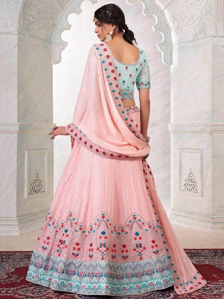 Fascinating Peach Sequined Work Georgette Party Wear Lehenga Choli