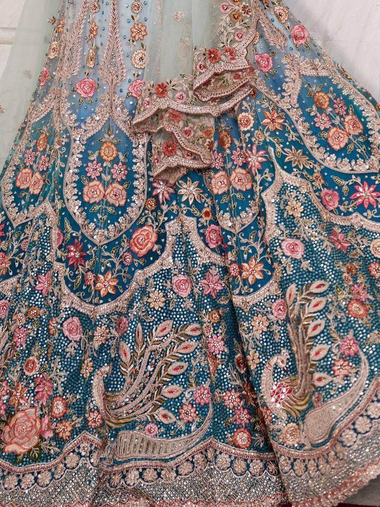 Captivating Blue Embroidered Net Party Wear Lehenga Choli