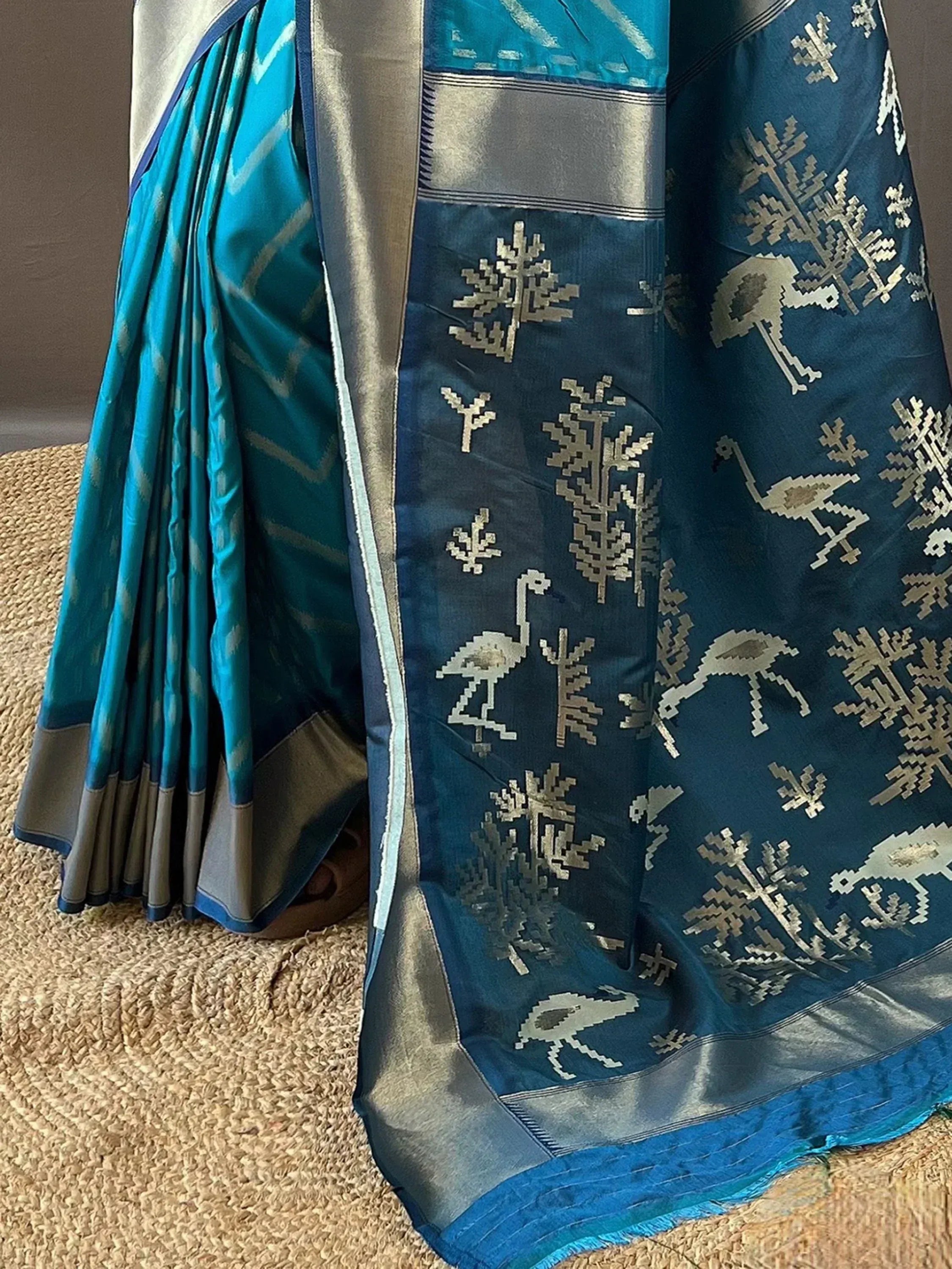 Teal blue saree with silver bird and tree motifs, ethnic Indian wear, designer silk saree