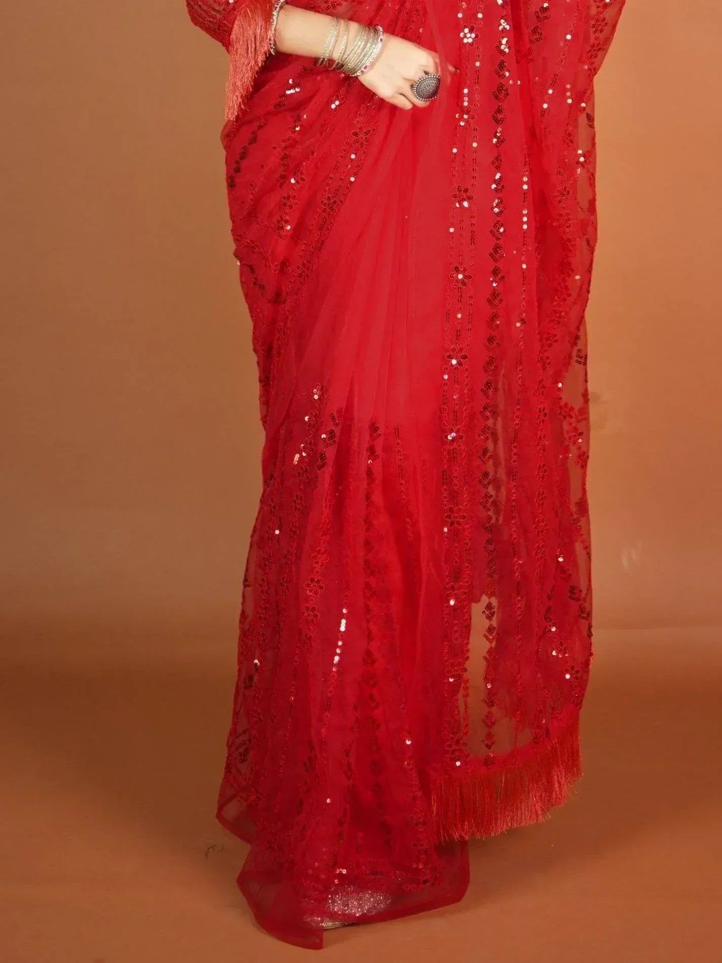 Red sequin embroidered saree with fringe detailing, perfect for Indian ethnic occasions