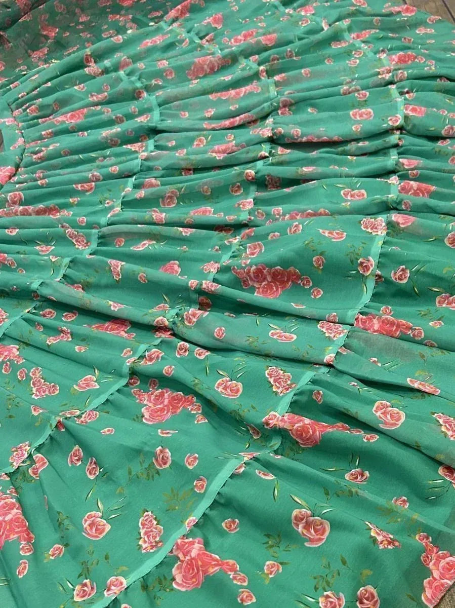 Green floral printed ethnic gown with ruffled layers and pink rose pattern