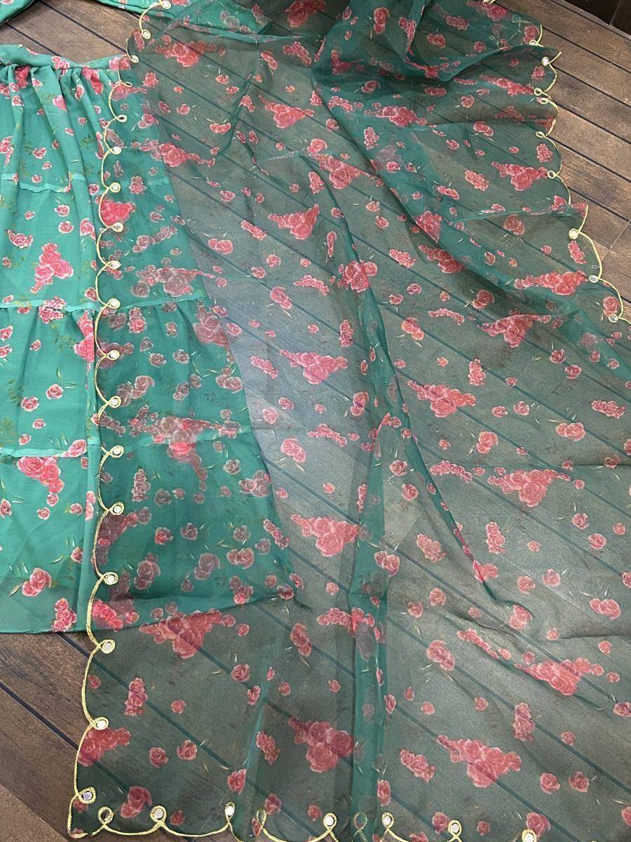 Green floral printed saree with gold border, ideal for ethnic wear and festive occasions