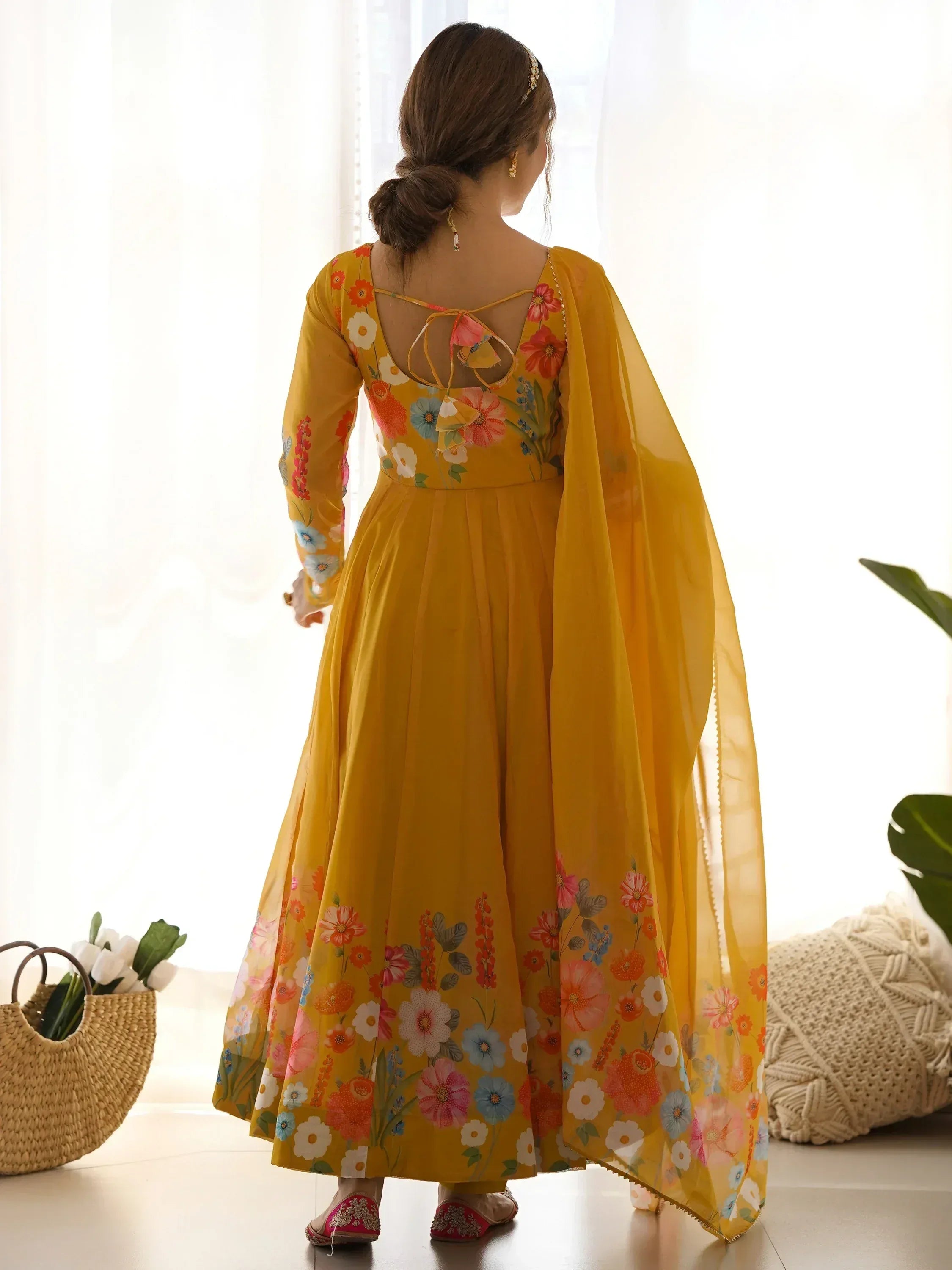 Yellow floral ethnic gown with back tie design and matching dupatta