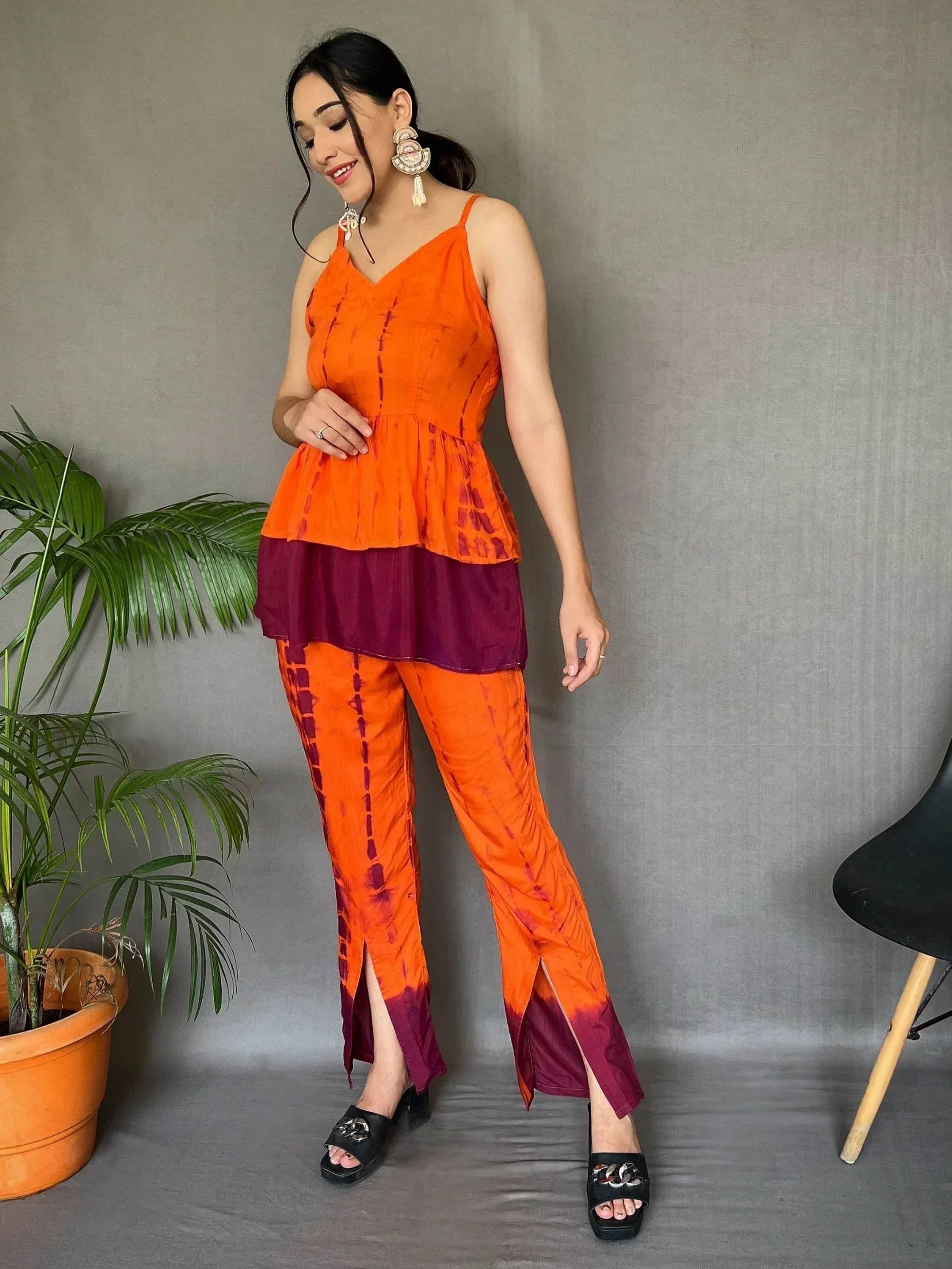 Orange and maroon tie-dye ethnic pantsuit with peplum top, perfect for Indian occasions