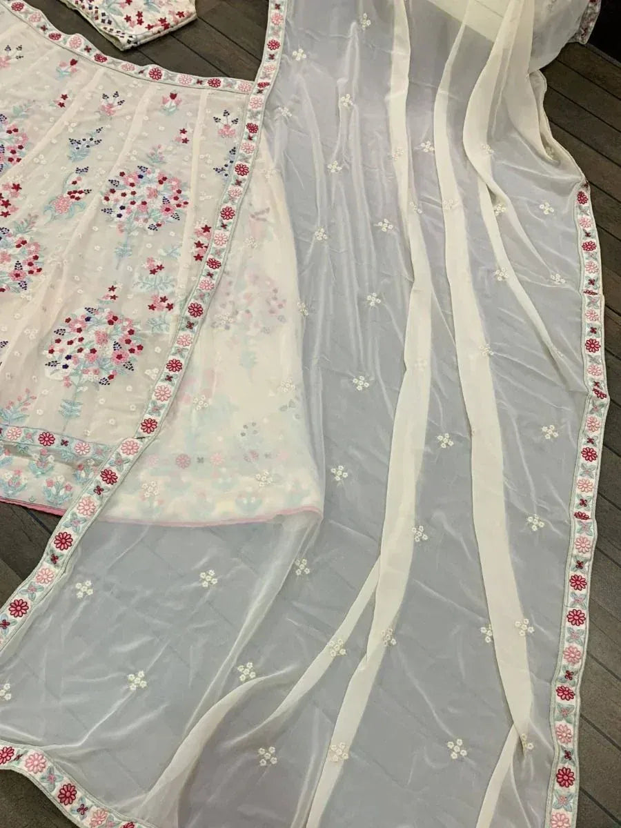 White floral embroidered lehenga choli with sheer dupatta, Indian ethnic wear