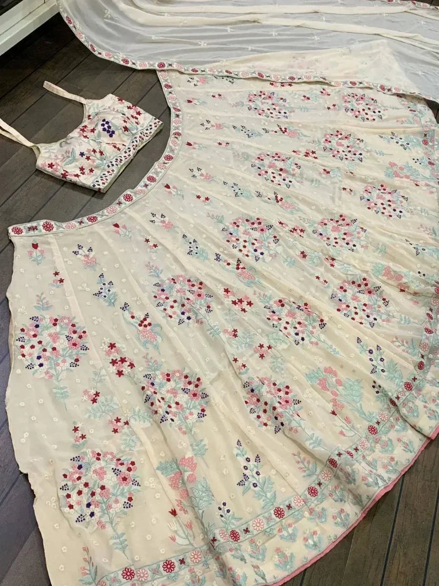 Floral embroidered off-white salwar kameez with matching dupatta, perfect for ethnic occasions